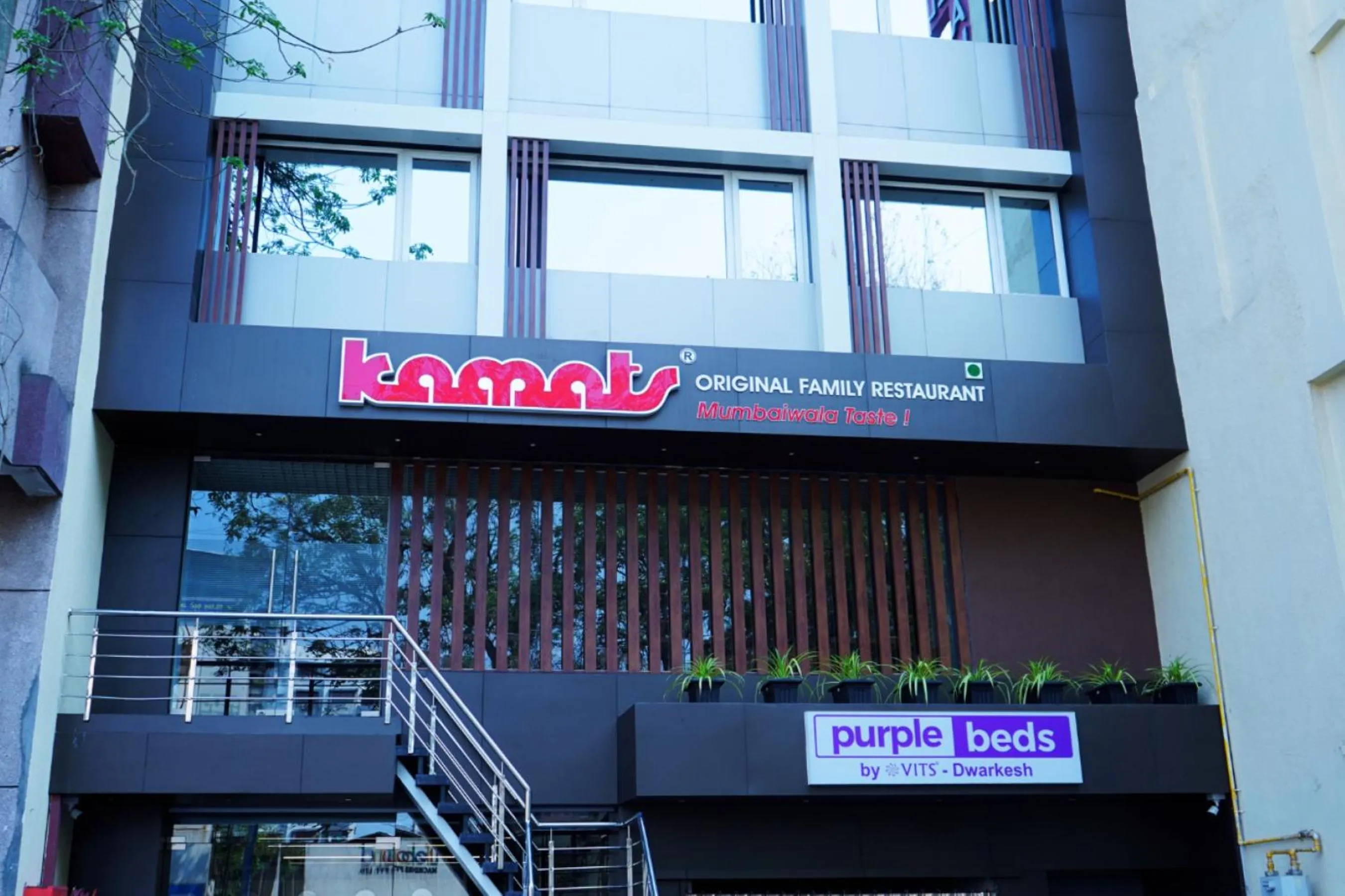 Facade/entrance in Purple Beds by VITS Dwarkesh, Surat