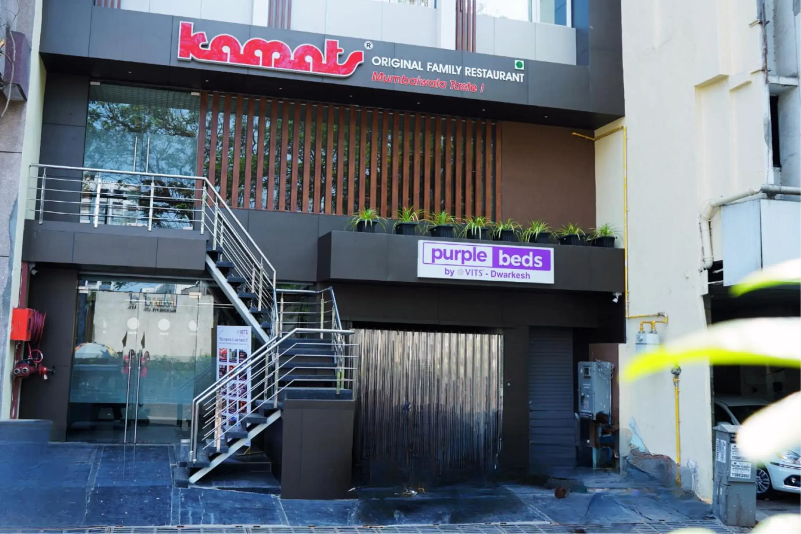 Facade/entrance in Purple Beds by VITS Dwarkesh, Surat Facade/entrance in Purple Beds by VITS Dwarkesh, Surat