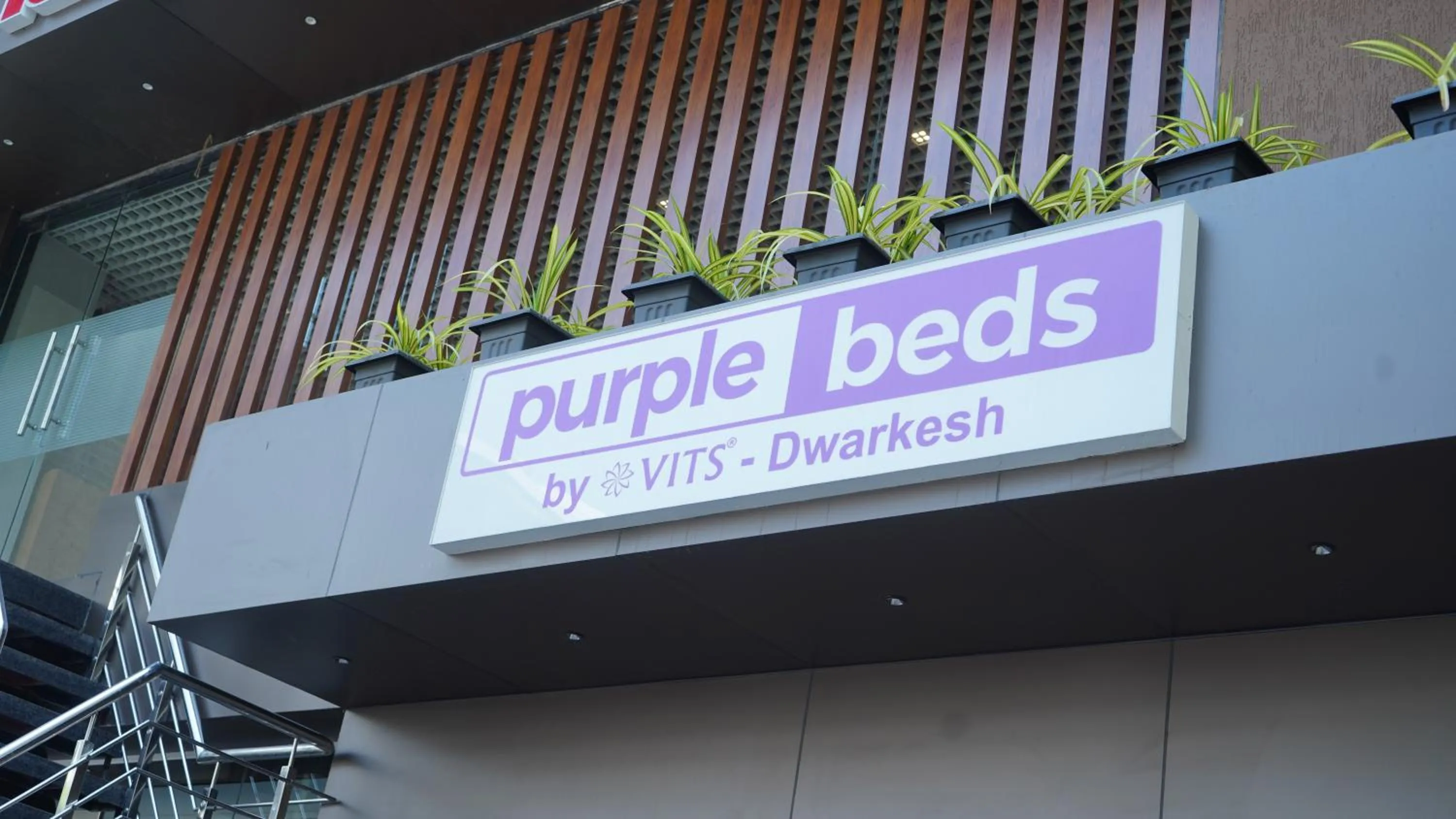 Facade/entrance in Purple Beds by VITS Dwarkesh, Surat