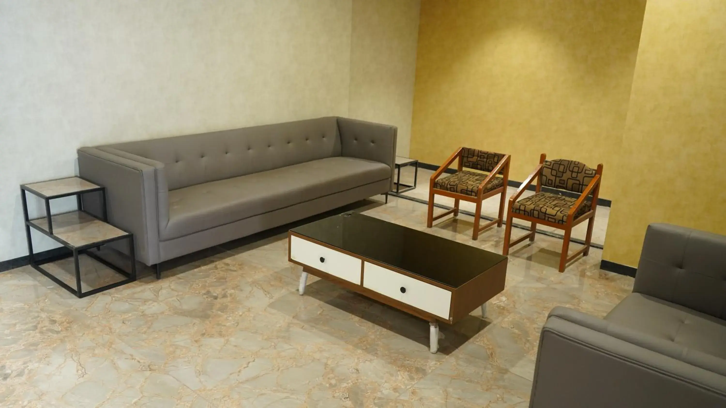 Seating area in Purple Beds by VITS Dwarkesh, Surat Seating area in Purple Beds by VITS Dwarkesh, Surat