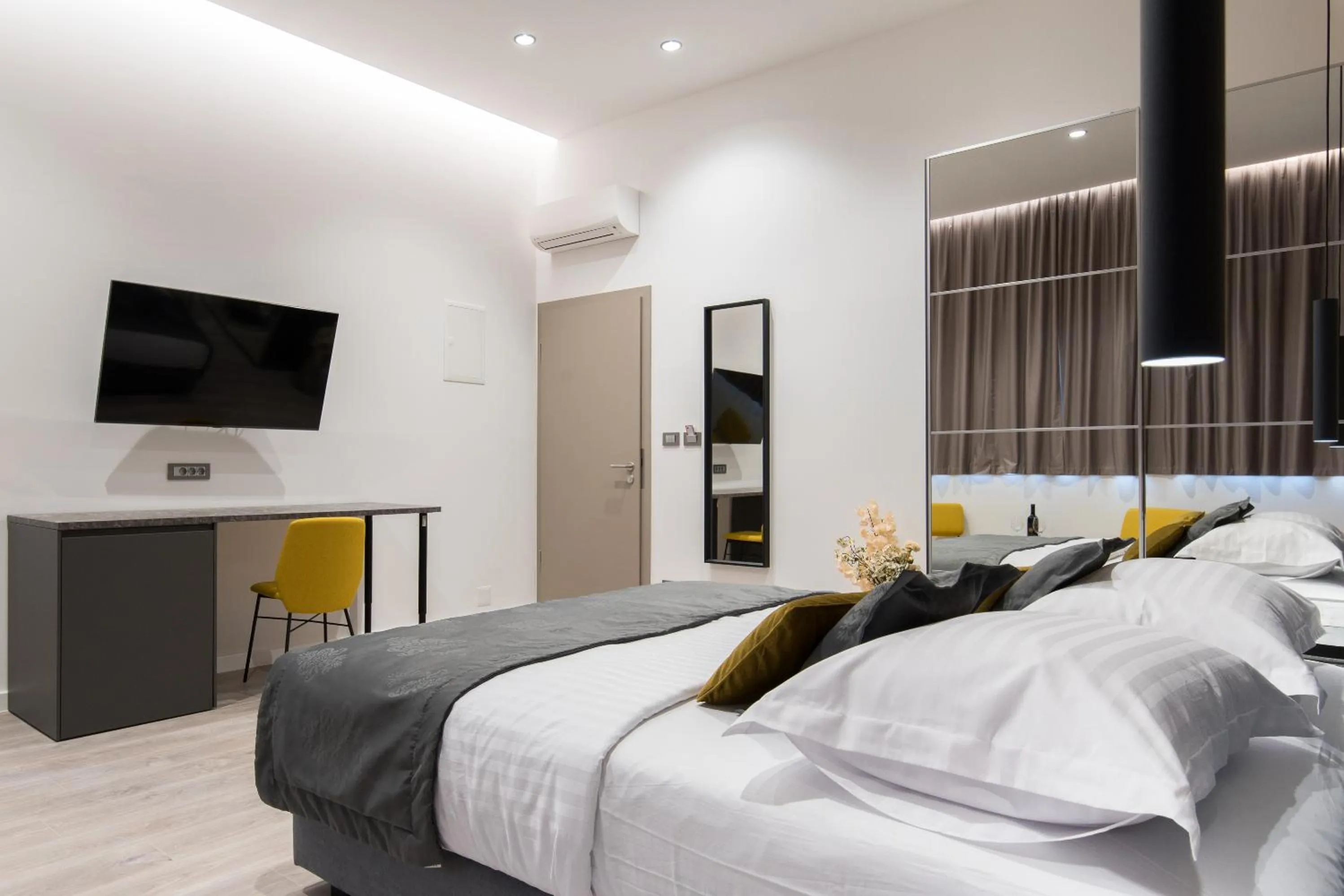 Bed in Seascape Luxury Rooms