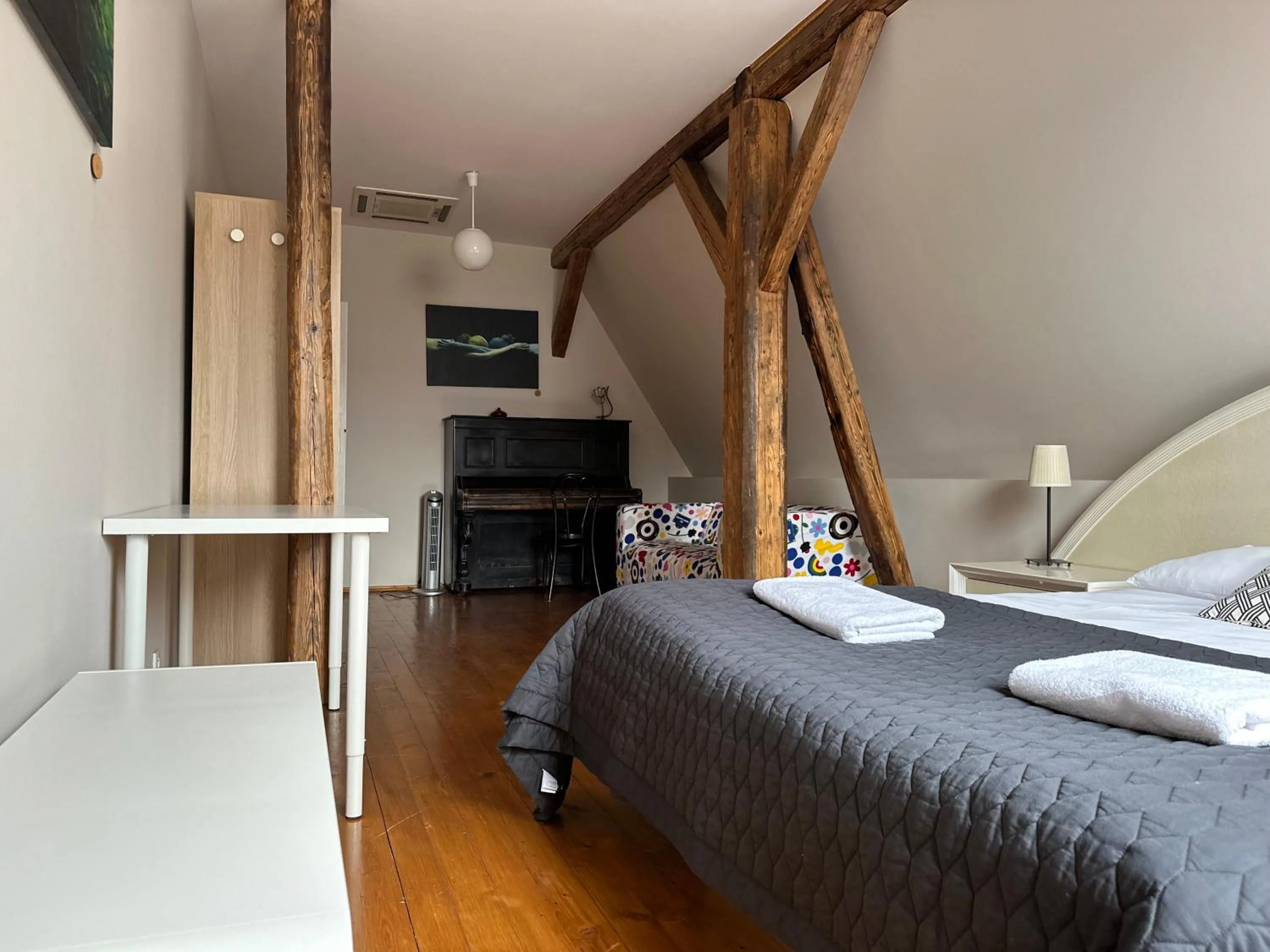 Bed in The Spiski Palace Apartments