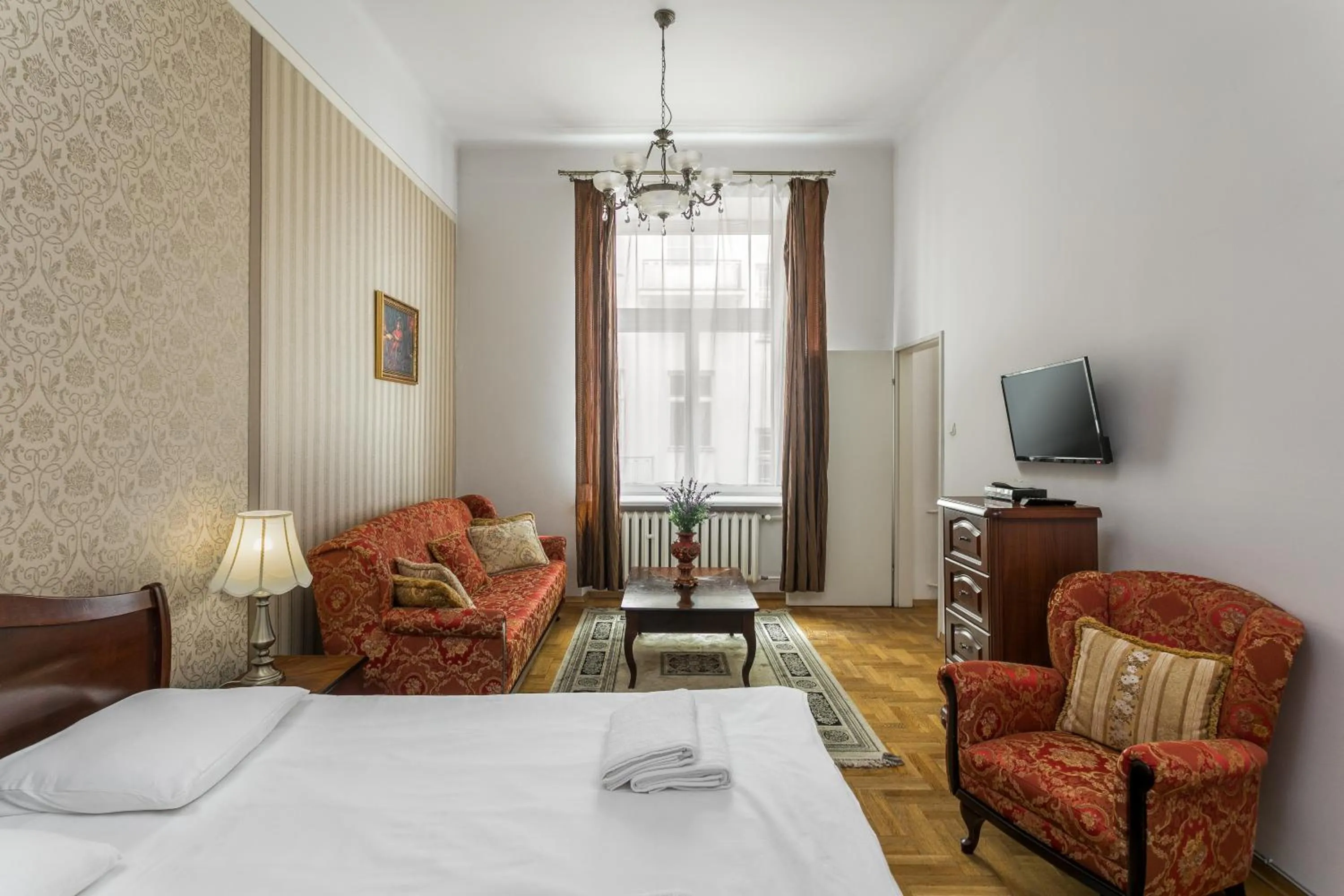 Bed in The Spiski Palace Apartments