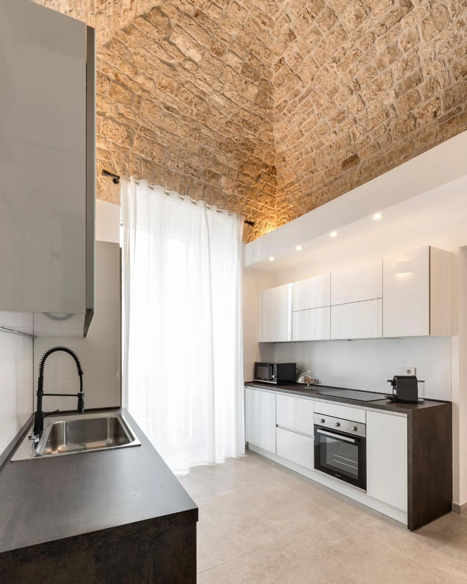 Kitchen or kitchenette in Casa Massima Suites & SPA