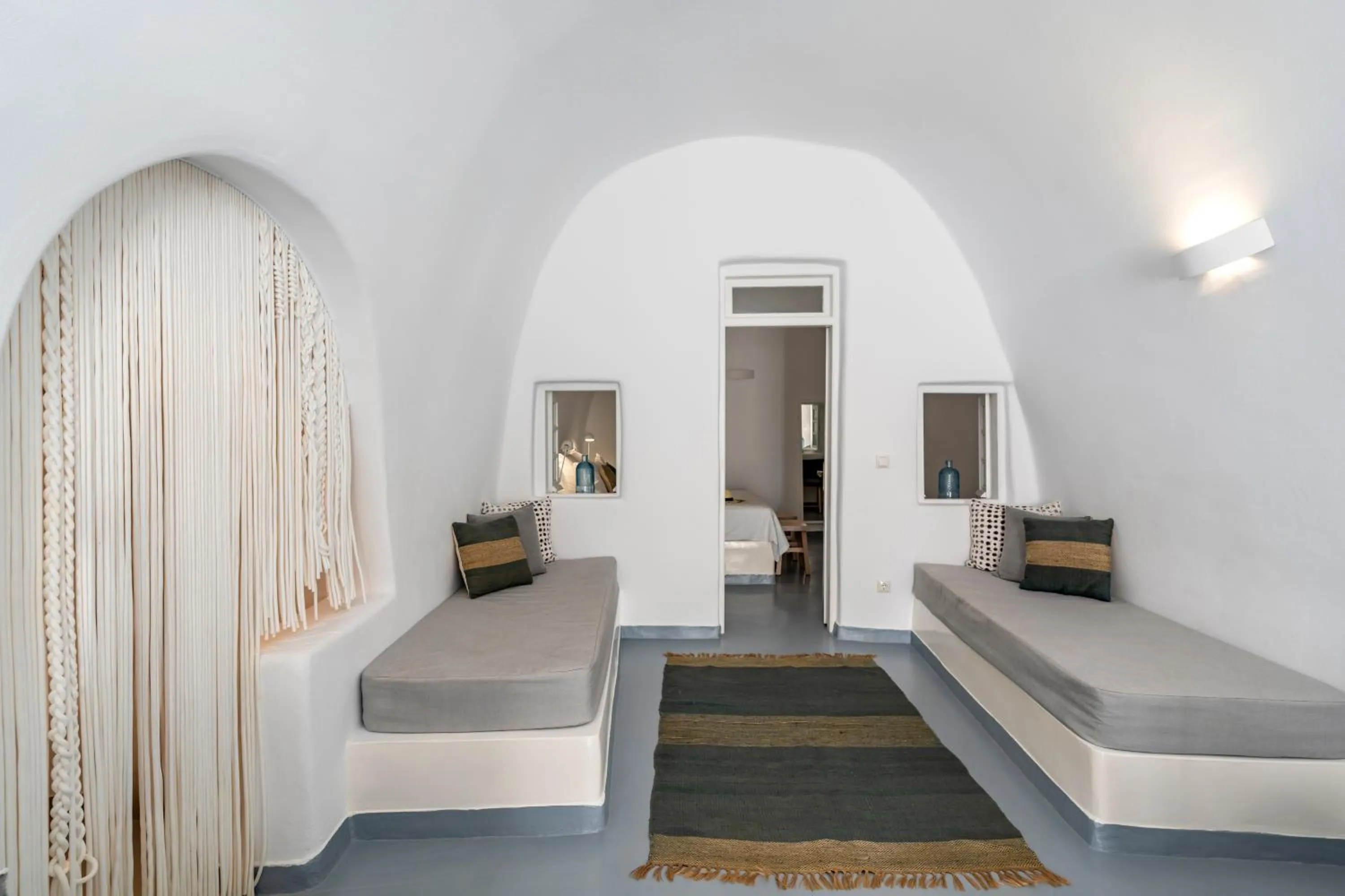 Living room, Bed in Cliff Side Suites