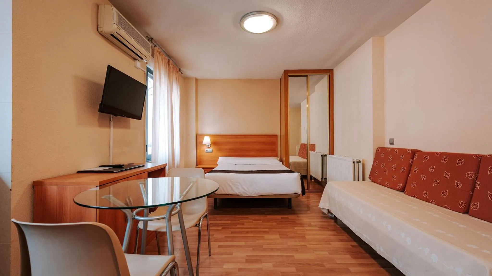 Photo of the whole room, Bed in JCH Congreso Apartamentos