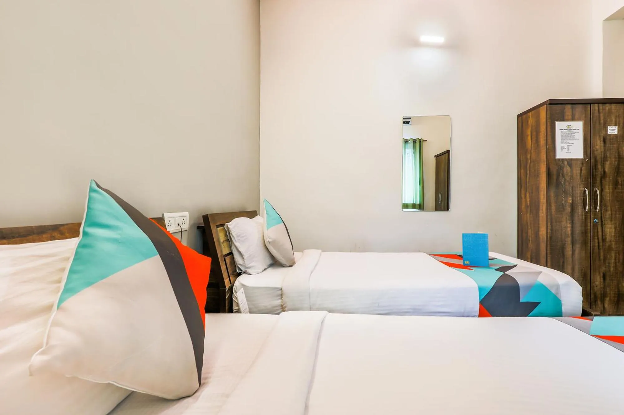 Photo of the whole room, Bed in FabExpress Diamond Residency - Airport road