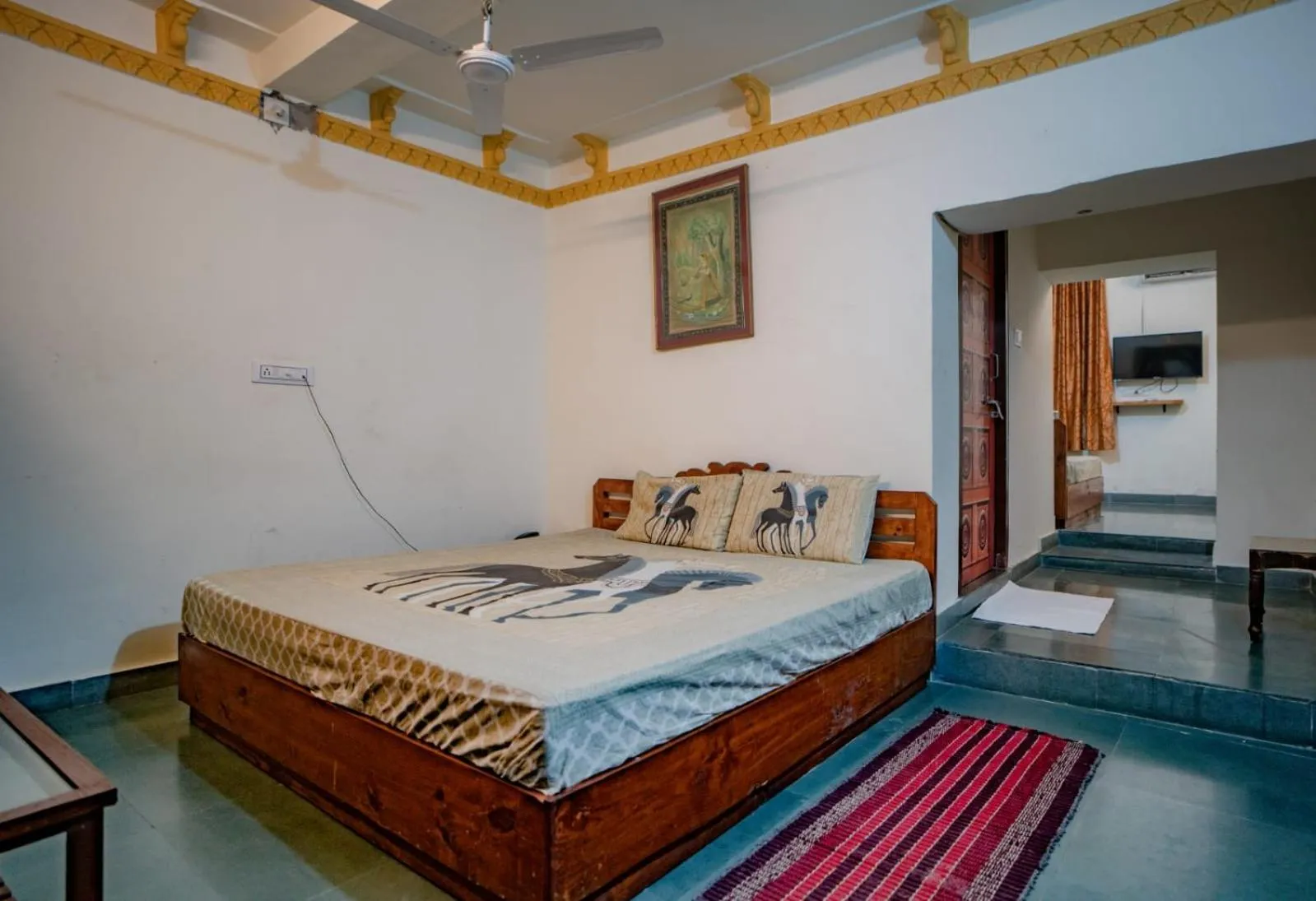 Bed in Hotel Ambavgarh Palace