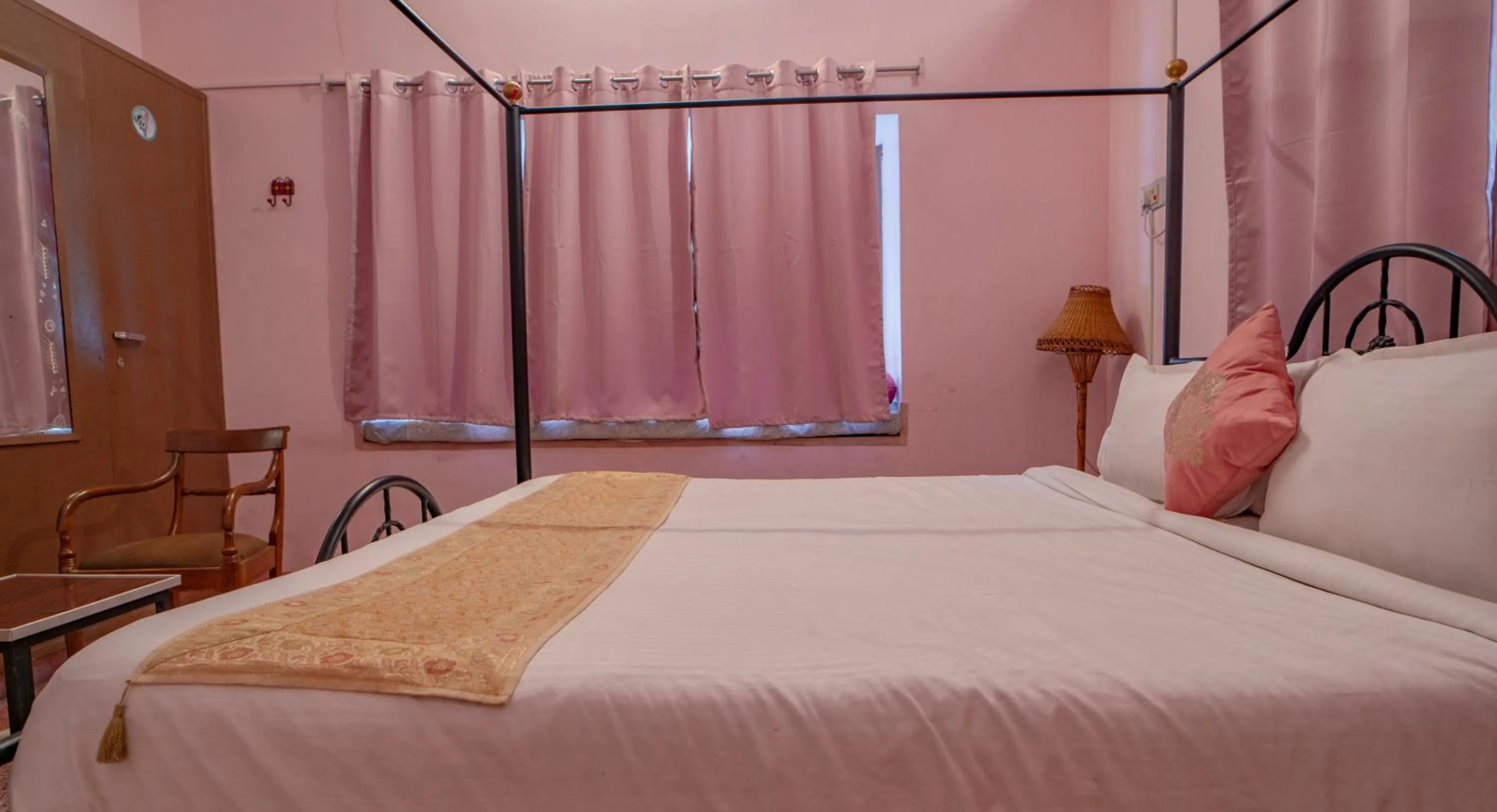 Bed in Hotel Ambavgarh Palace