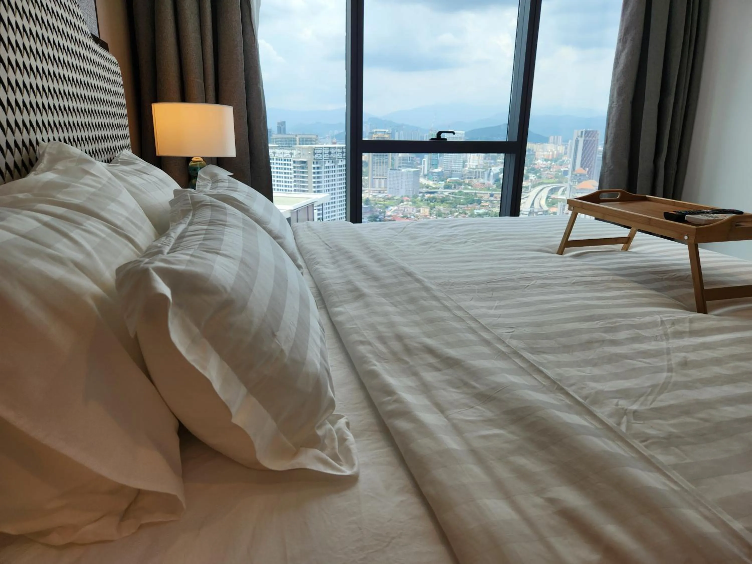 Bed in The Platinum 2 Premium Suite by Reluxe