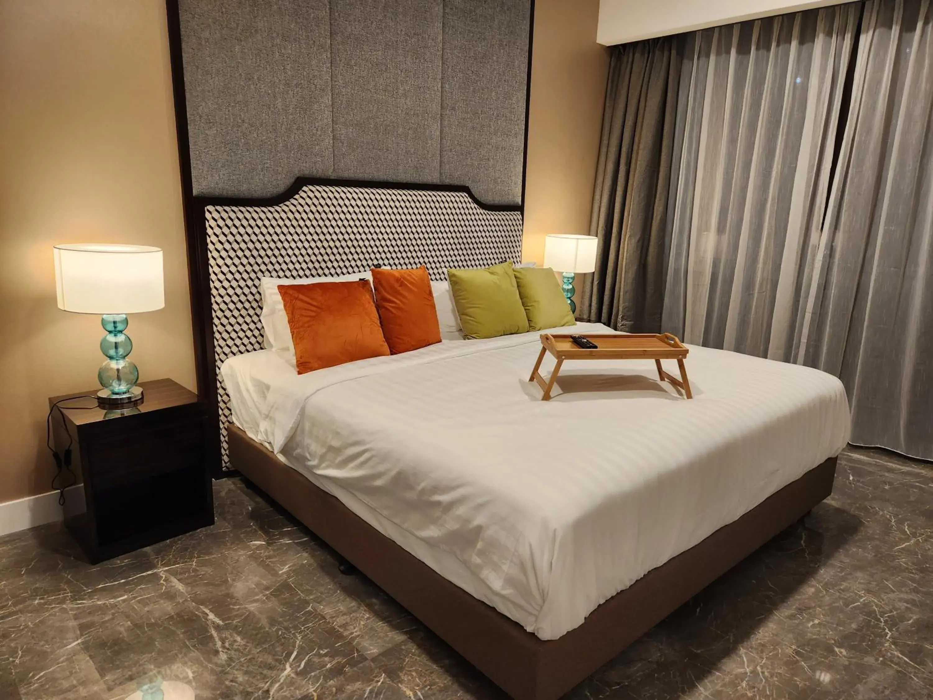 Bed in The Platinum 2 Premium Suite by Reluxe Bed in The Platinum 2 Premium Suite by Reluxe