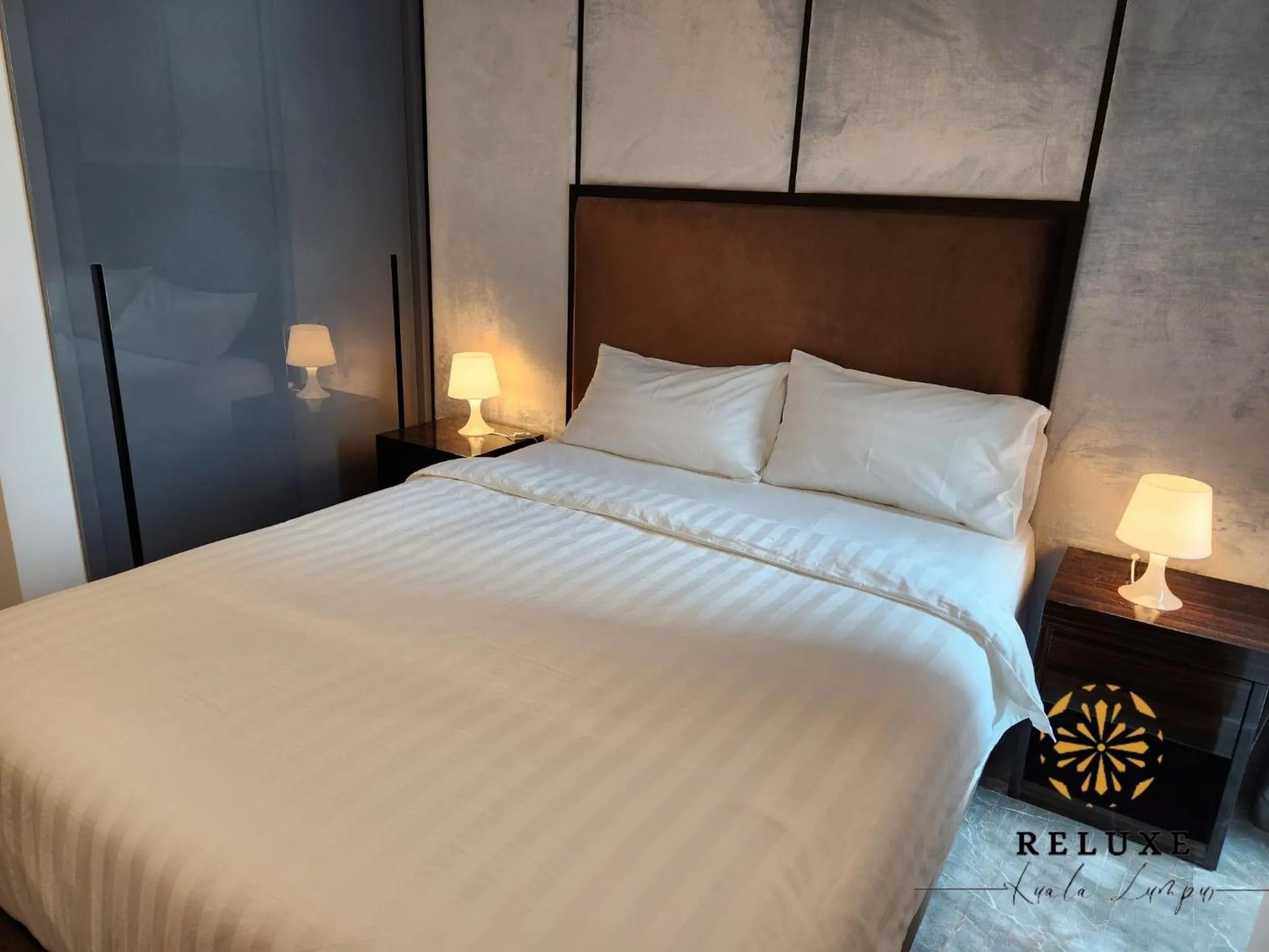 Bed in The Platinum 2 Premium Suite by Reluxe