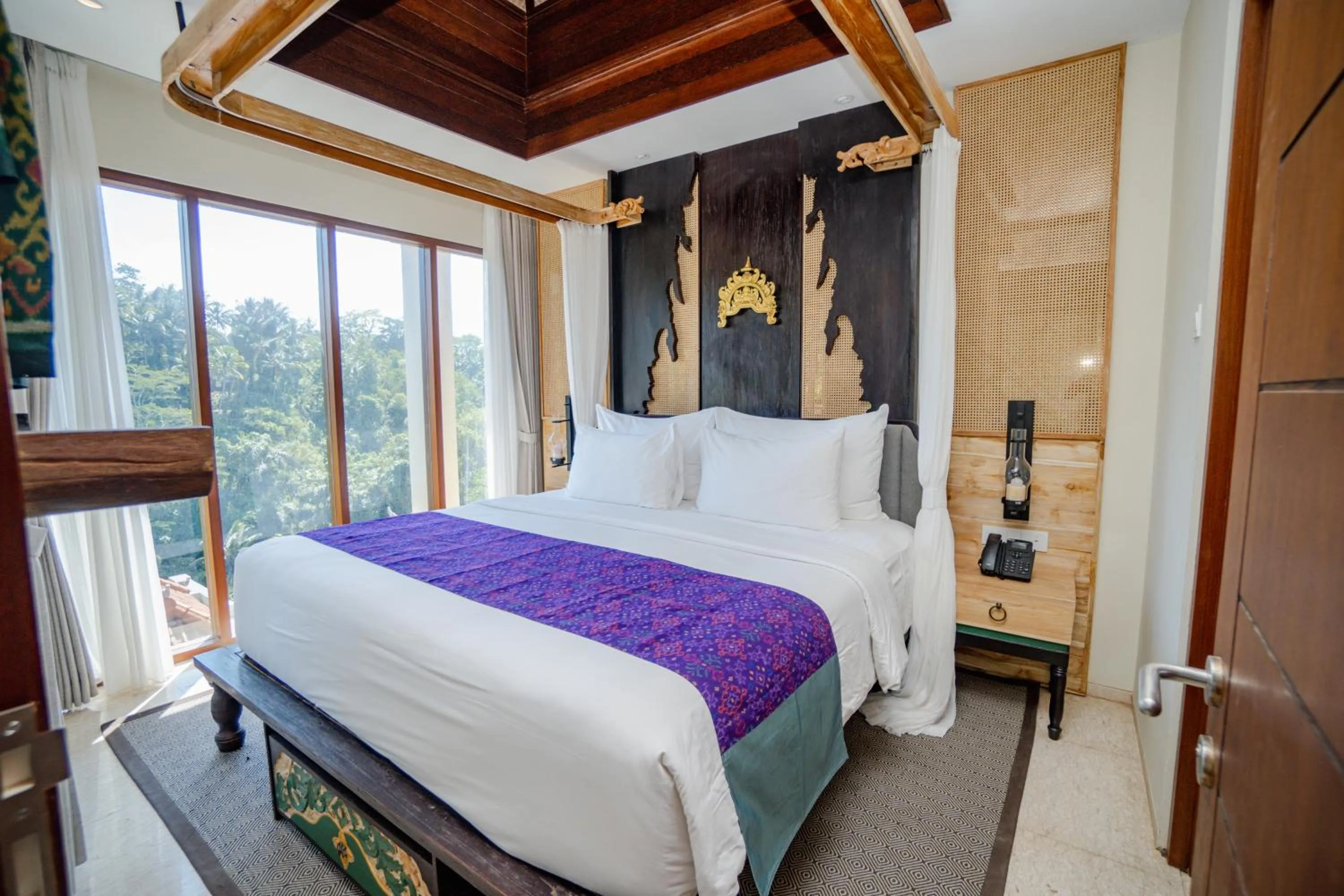 Bed in Horison Ume Suites & Villas