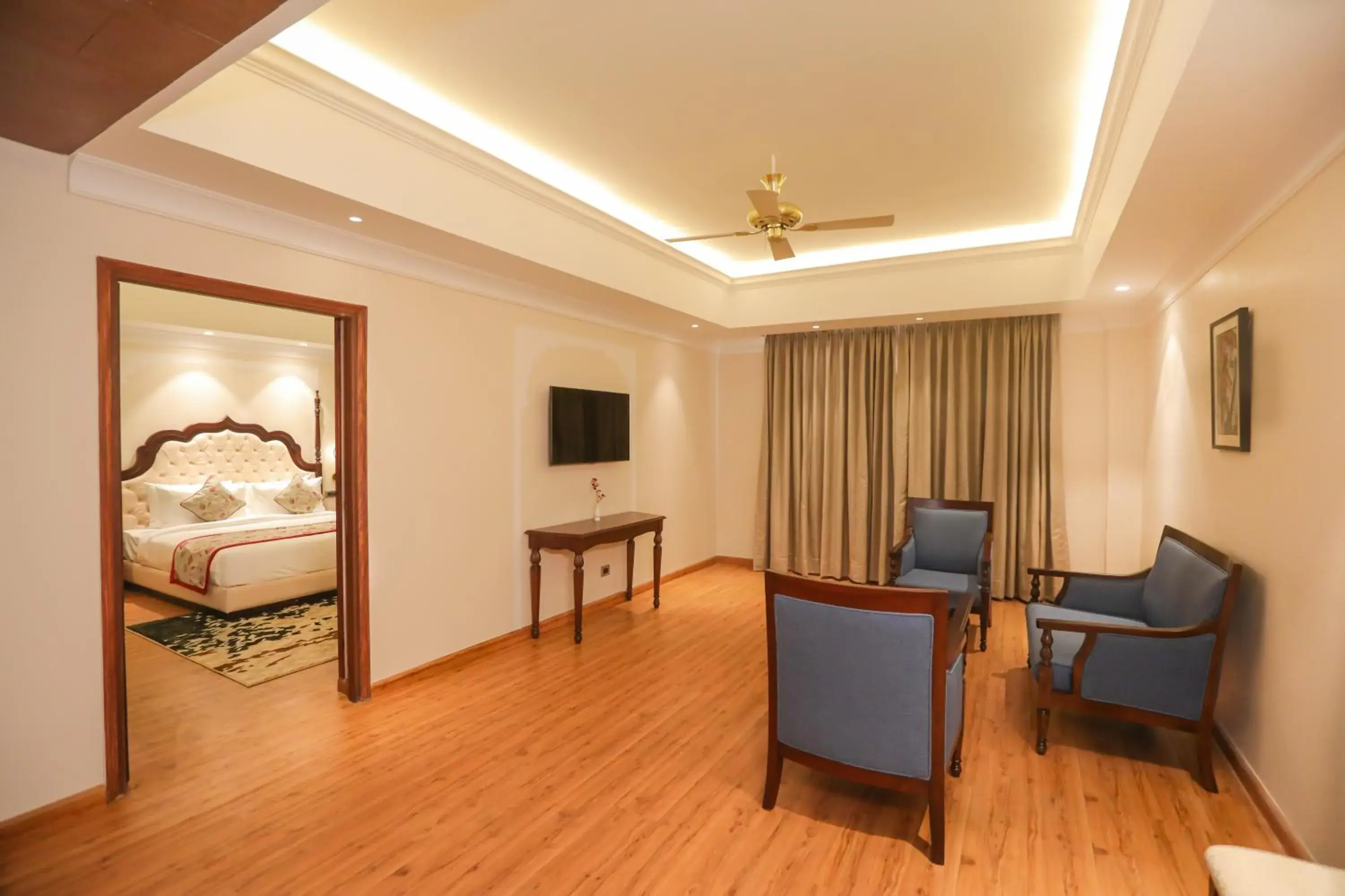 Seating area, Bed in Regenta City Vilas Palace Ambala Seating area, Bed in Regenta City Vilas Palace Ambala