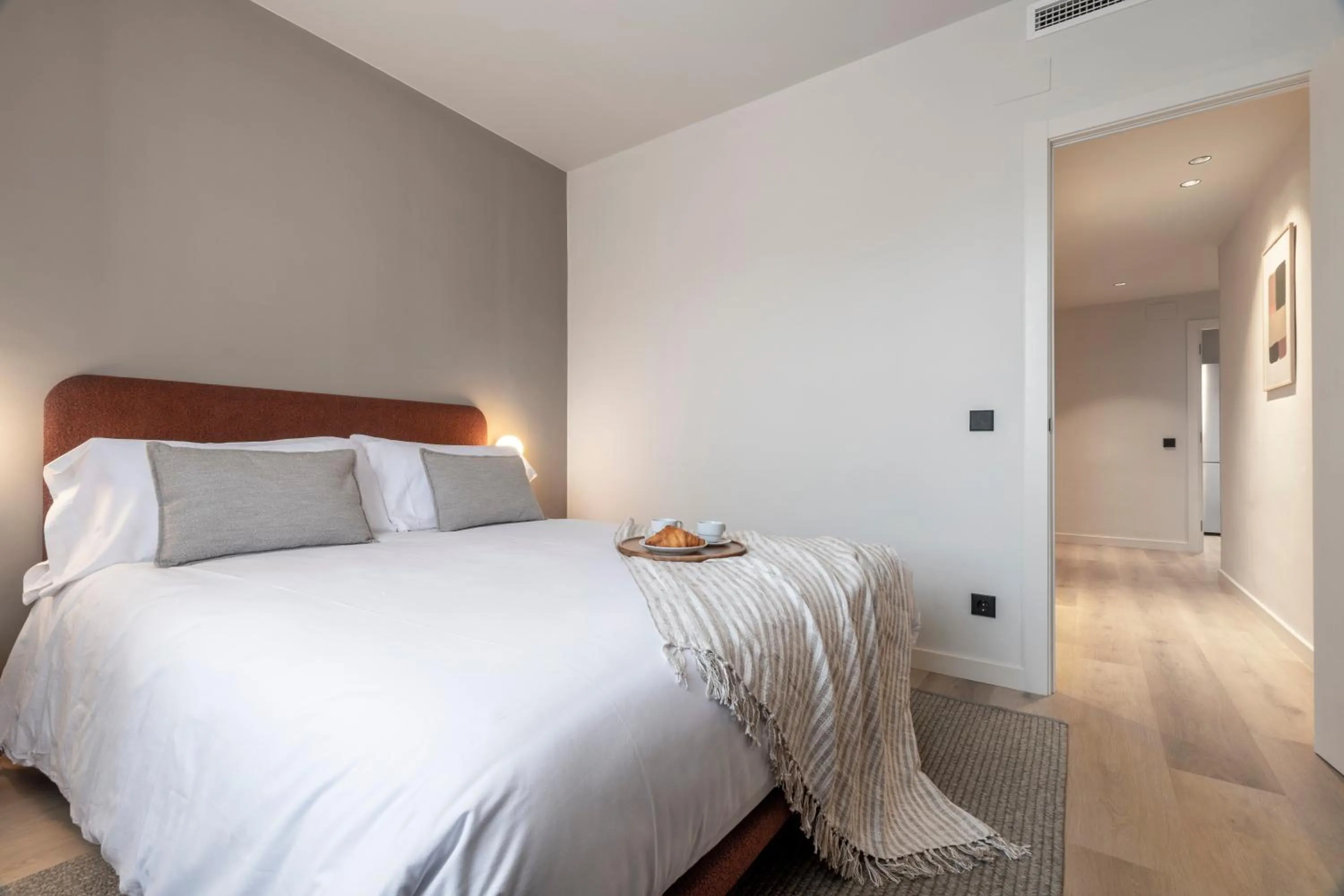 Bed in Arrivo Apartments