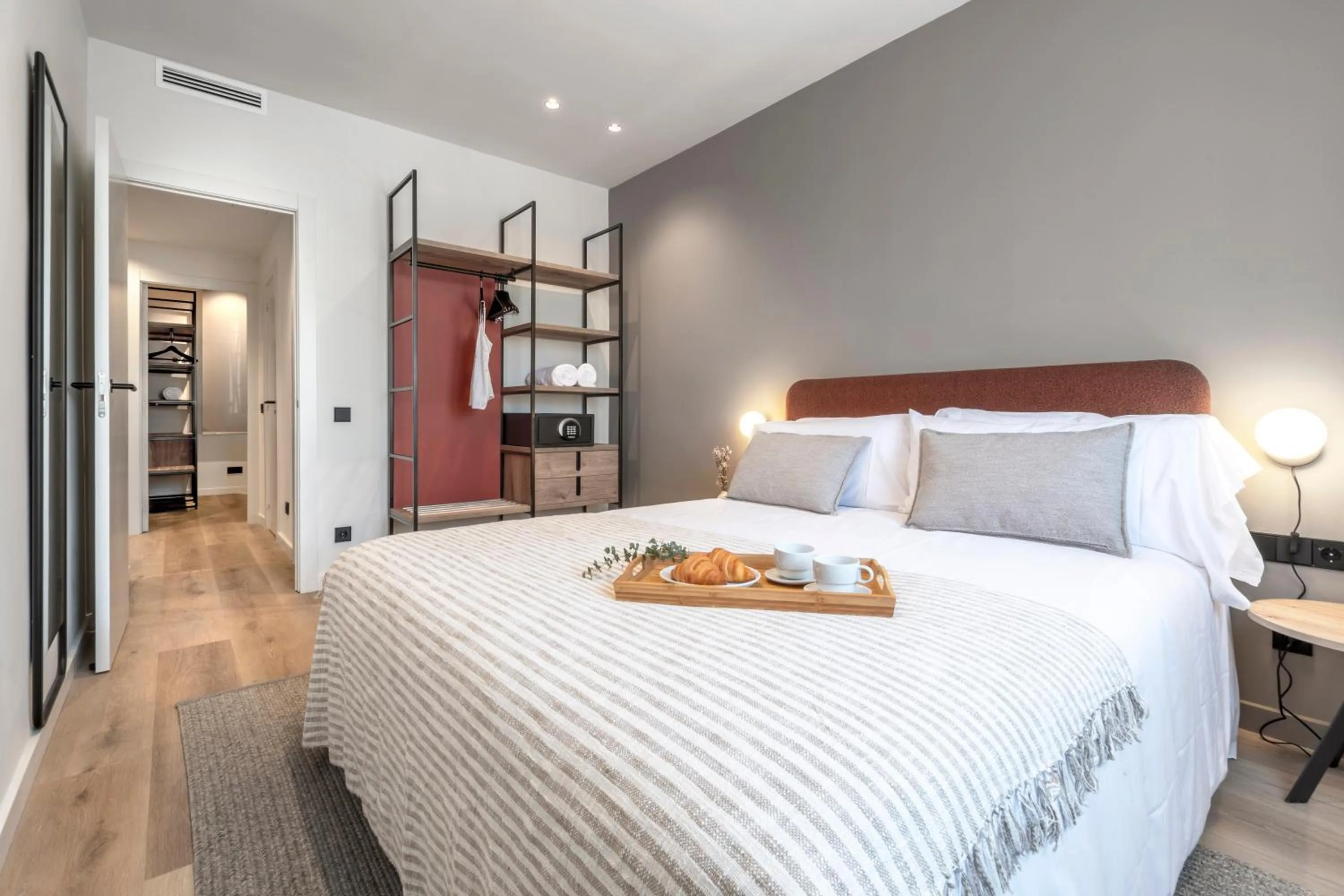 Bed in Arrivo Apartments