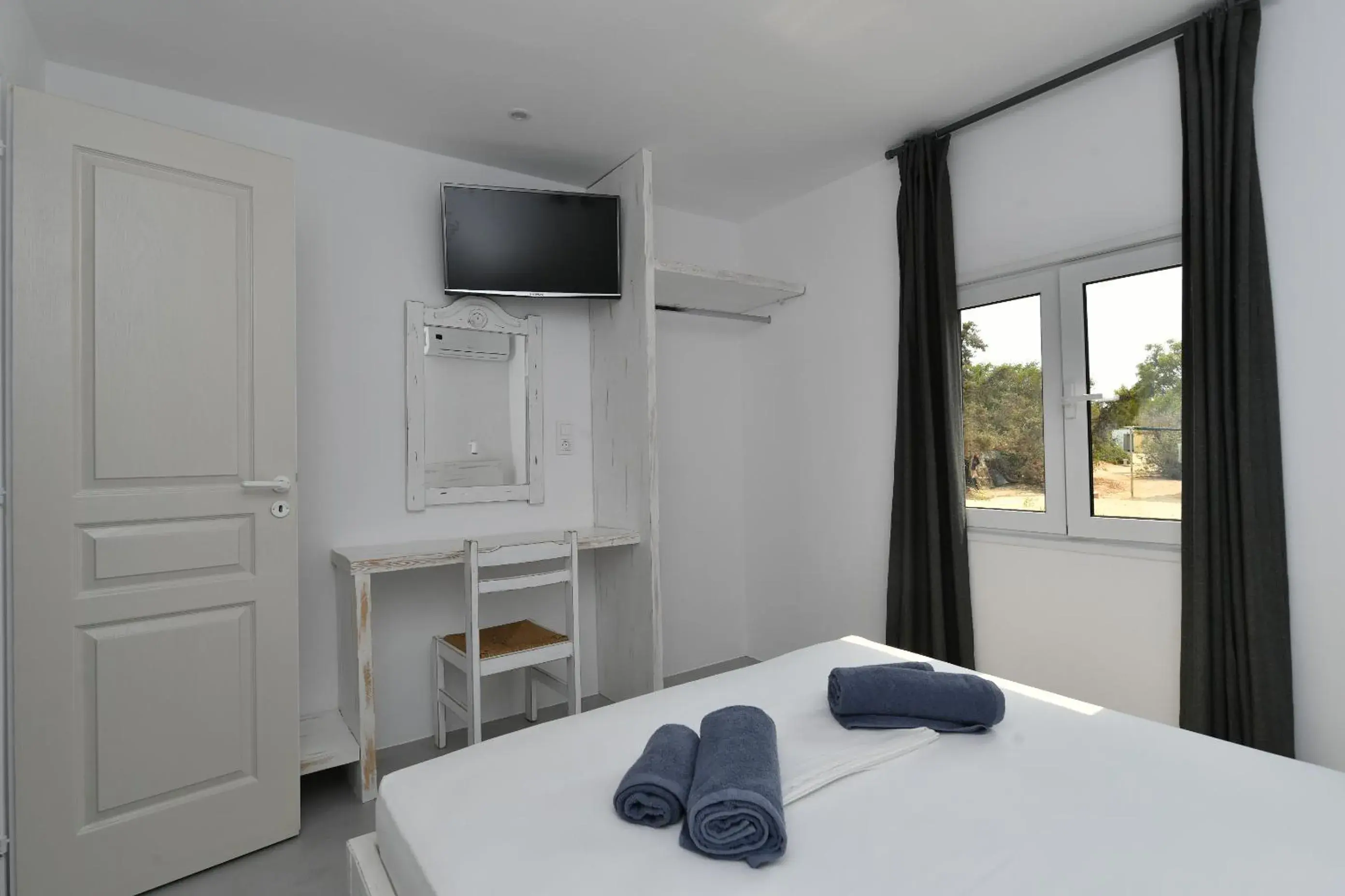 Bedroom in Surfing Beach Village Paros Bedroom in Surfing Beach Village Paros