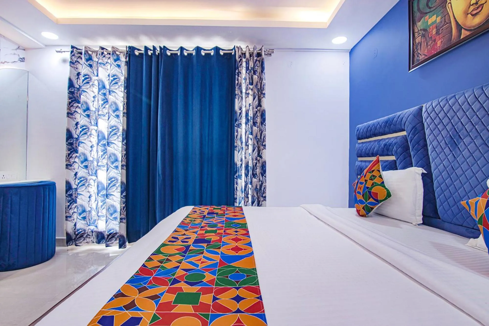Bed in FabHotel Satyam International