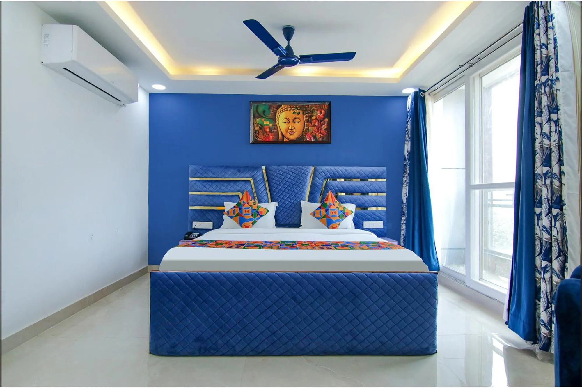Bed in FabHotel Satyam International