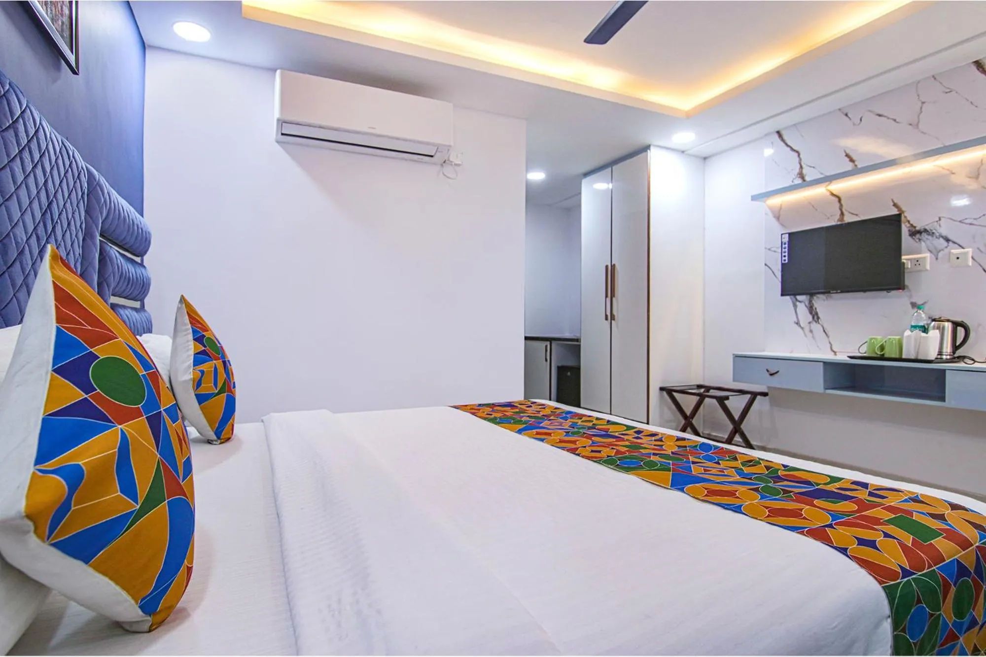 Bed in FabHotel Satyam International