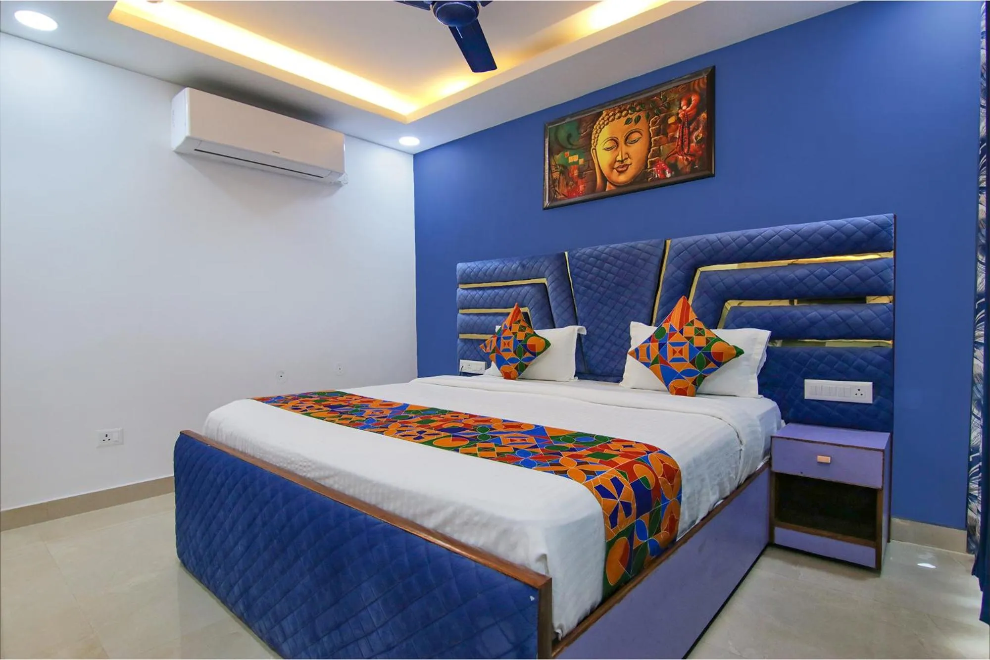 Bed in FabHotel Satyam International