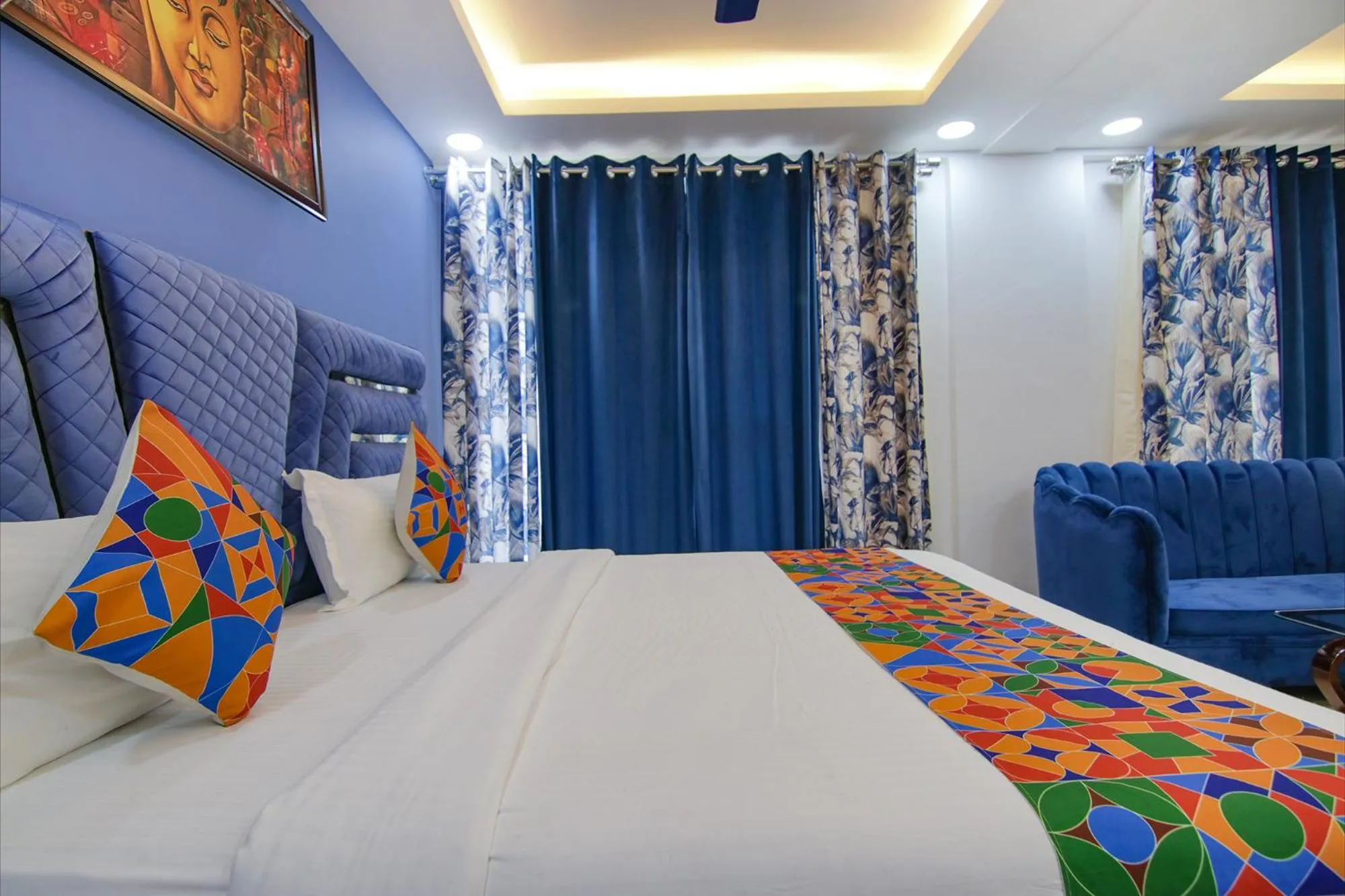 Bed in FabHotel Satyam International