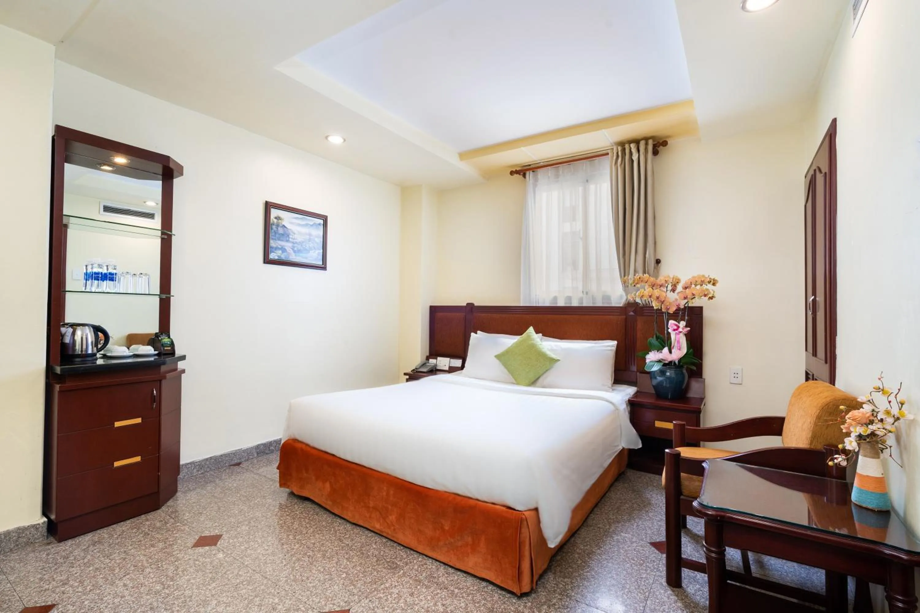 Bed in LUCASTA SAIGON Hotel