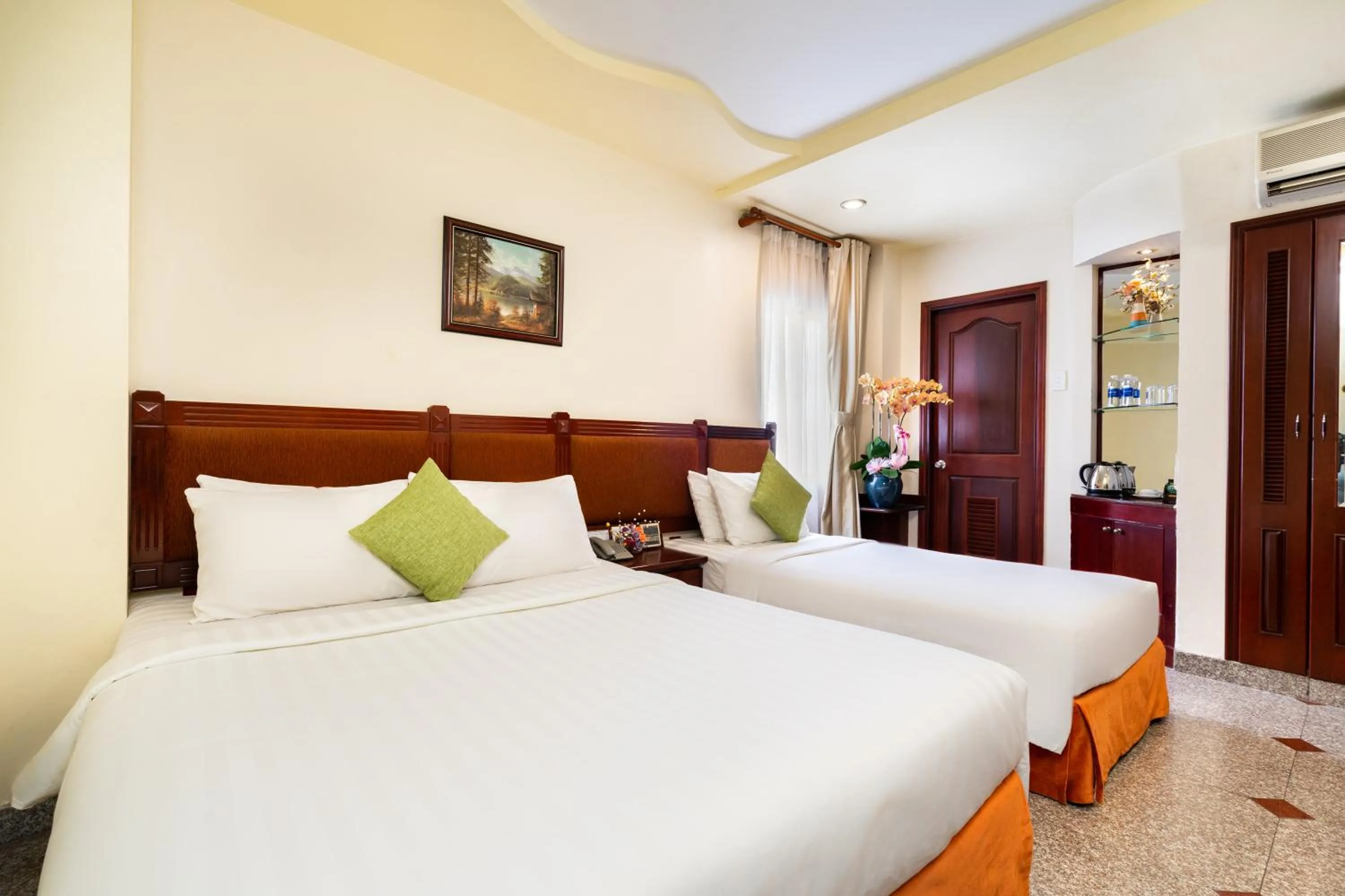 Bed in LUCASTA SAIGON Hotel