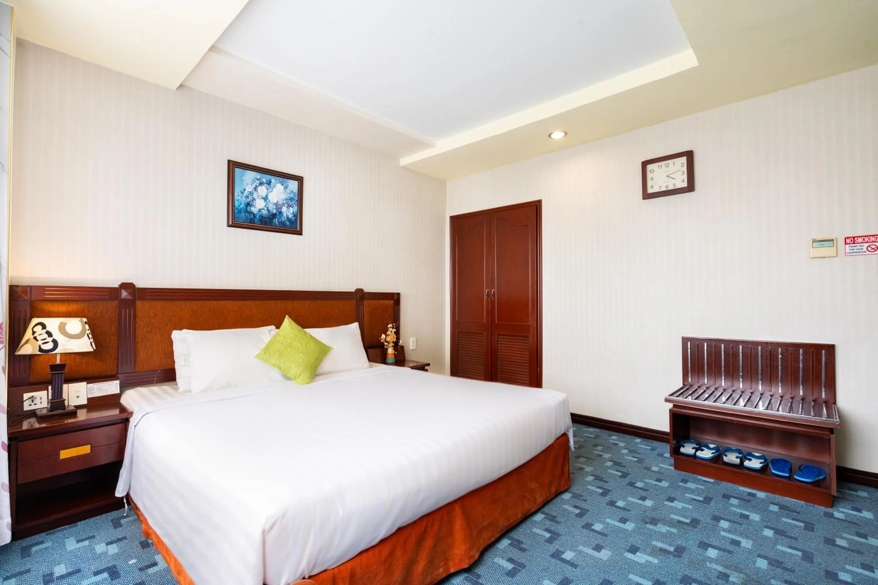 Bed in LUCASTA SAIGON Hotel