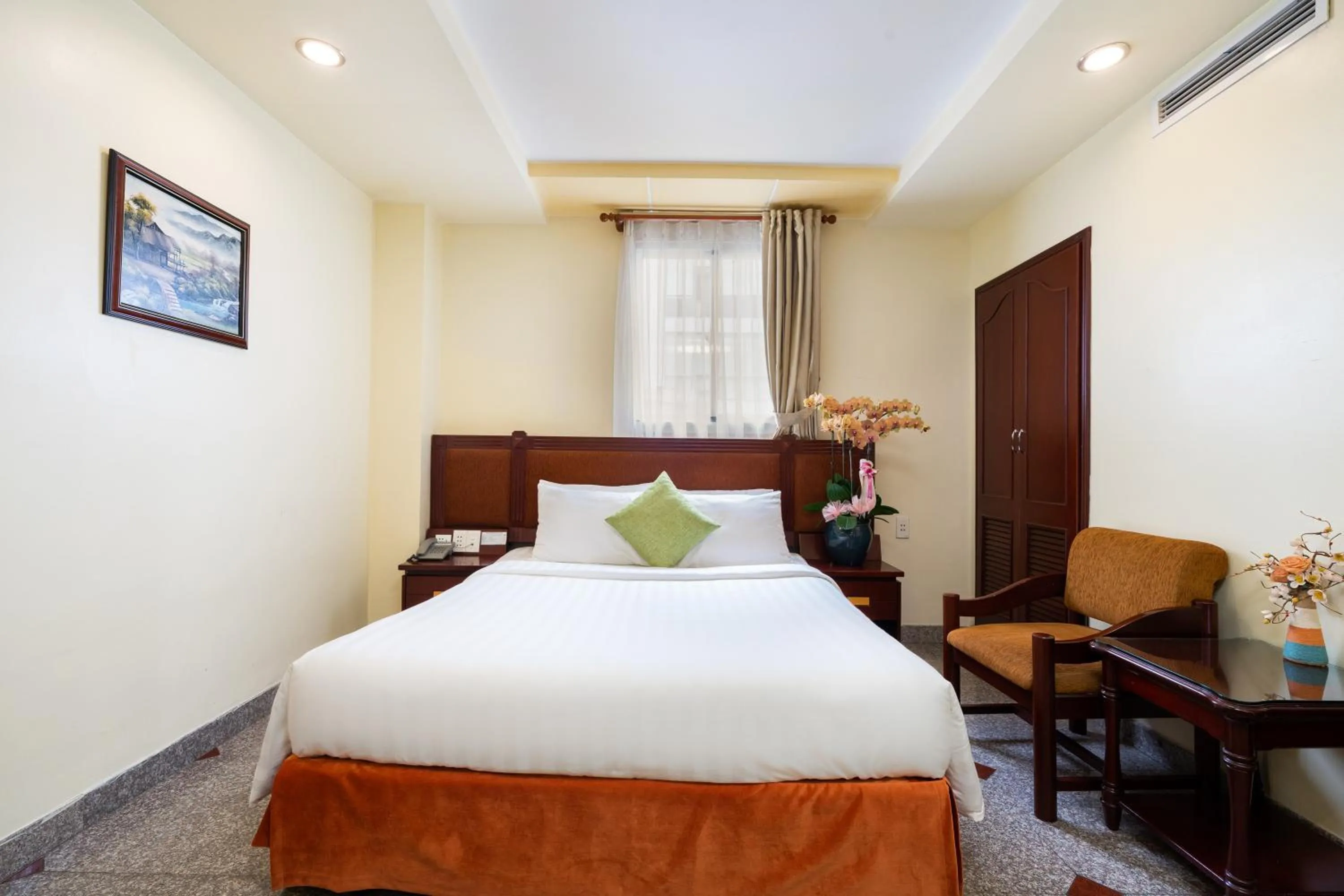 Bed in LUCASTA SAIGON Hotel