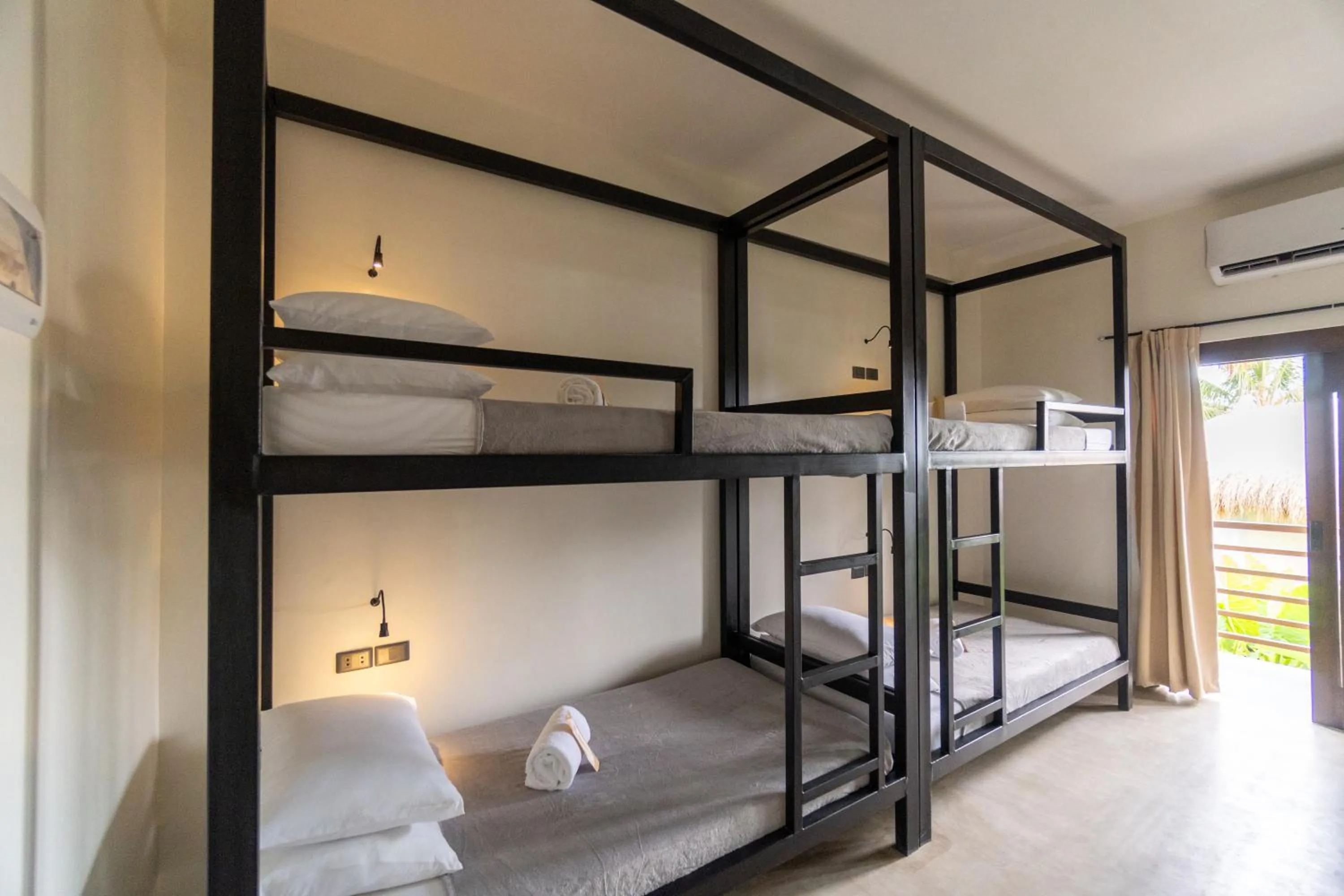 Bed in La Joya Farm Resort & Spa