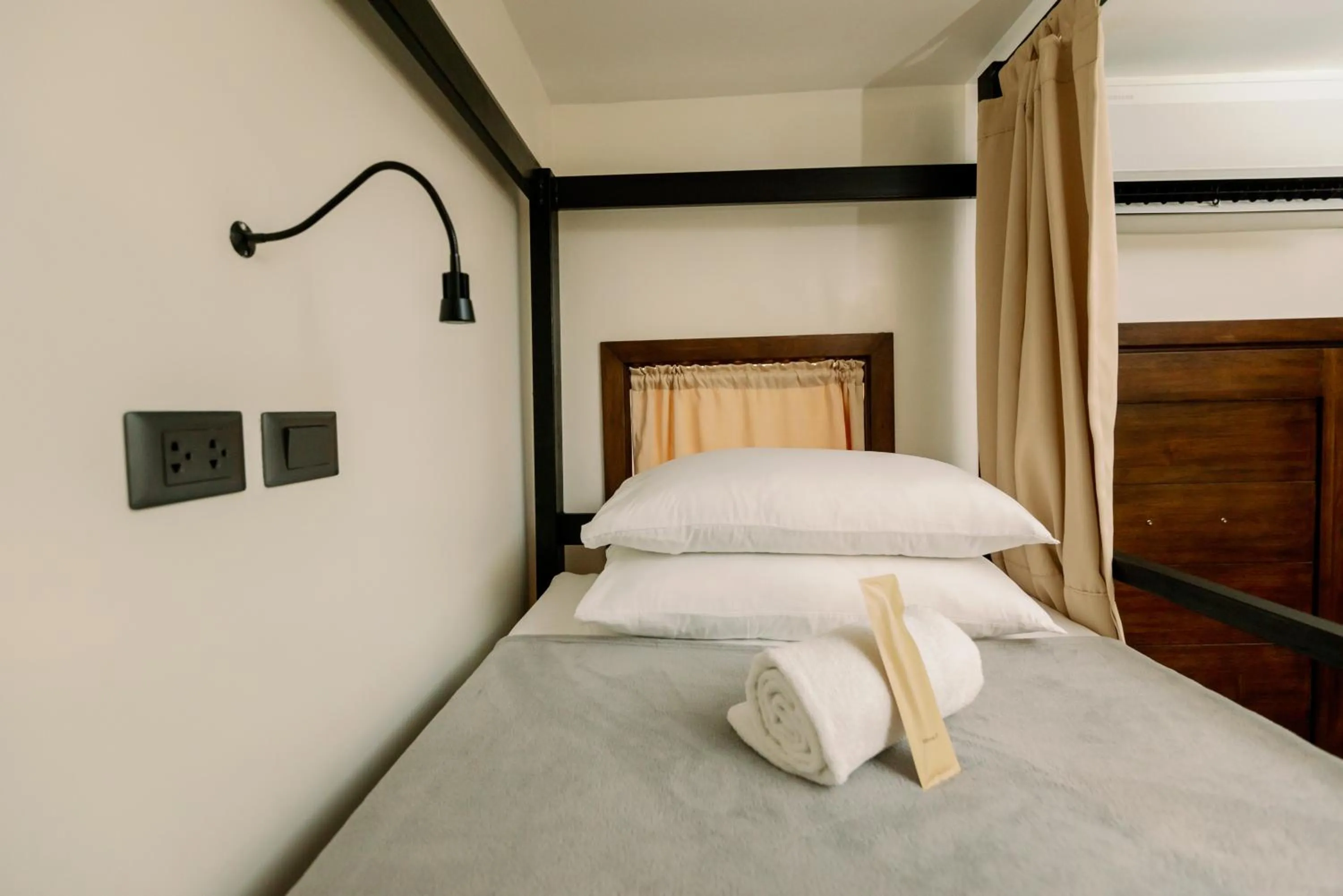 Bed in La Joya Farm Resort & Spa