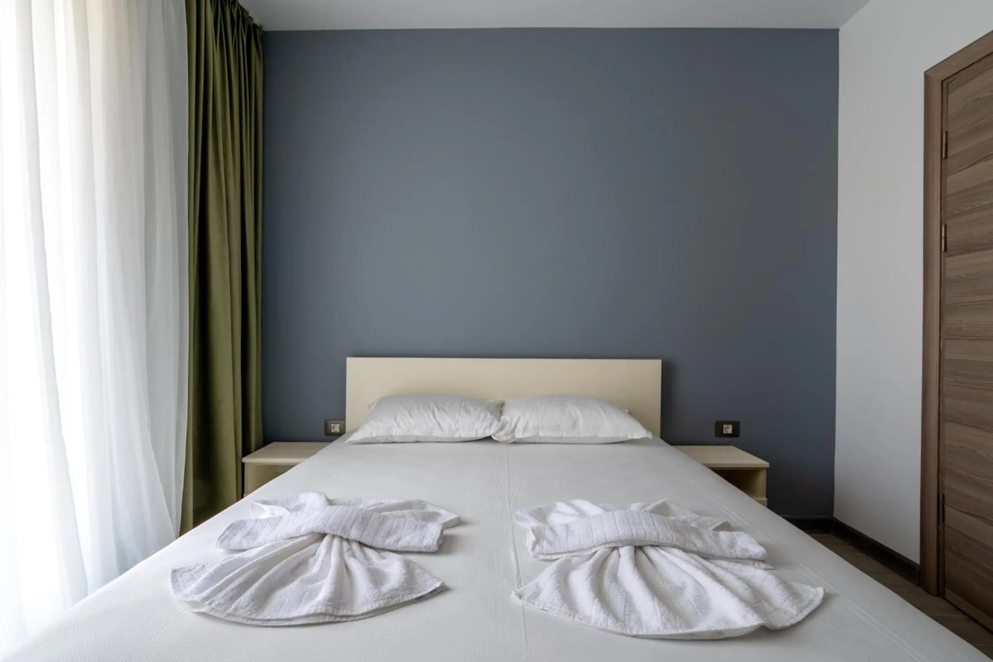 Bed in Apartamente Miramare by Alz