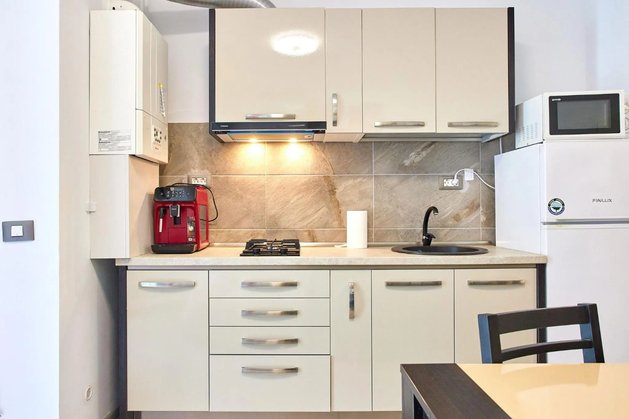 Kitchen or kitchenette in Apartamente Miramare by Alz