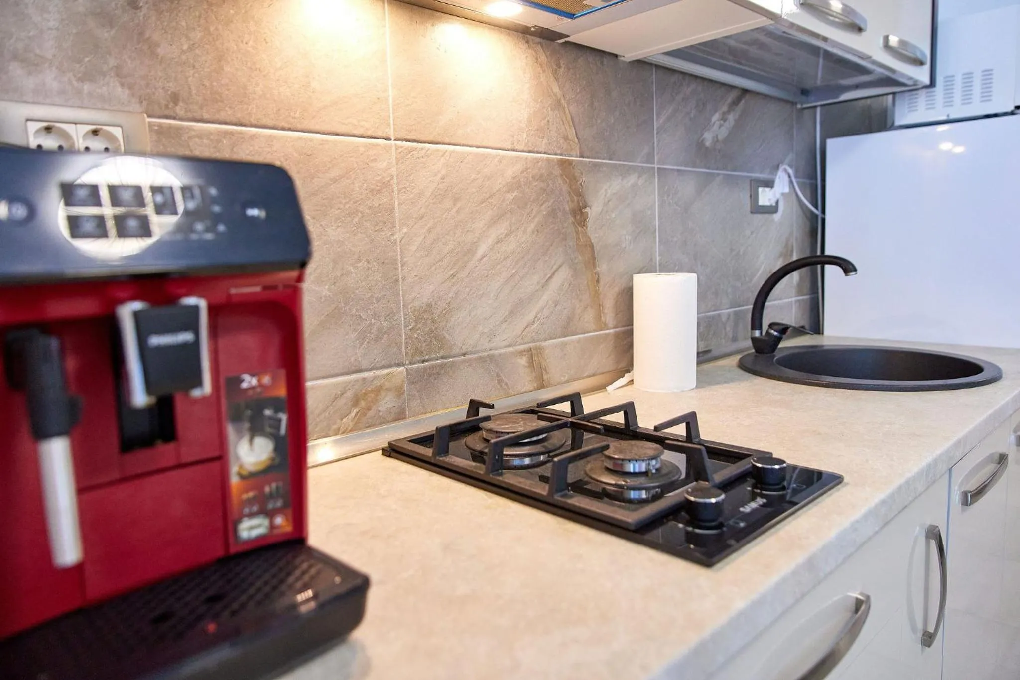 Kitchen or kitchenette in Apartamente Miramare by Alz