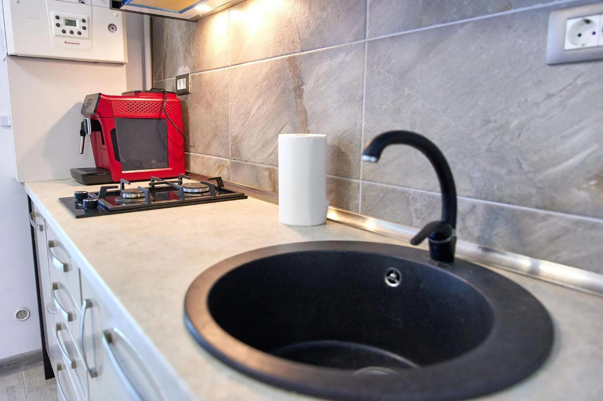 Kitchen or kitchenette in Apartamente Miramare by Alz