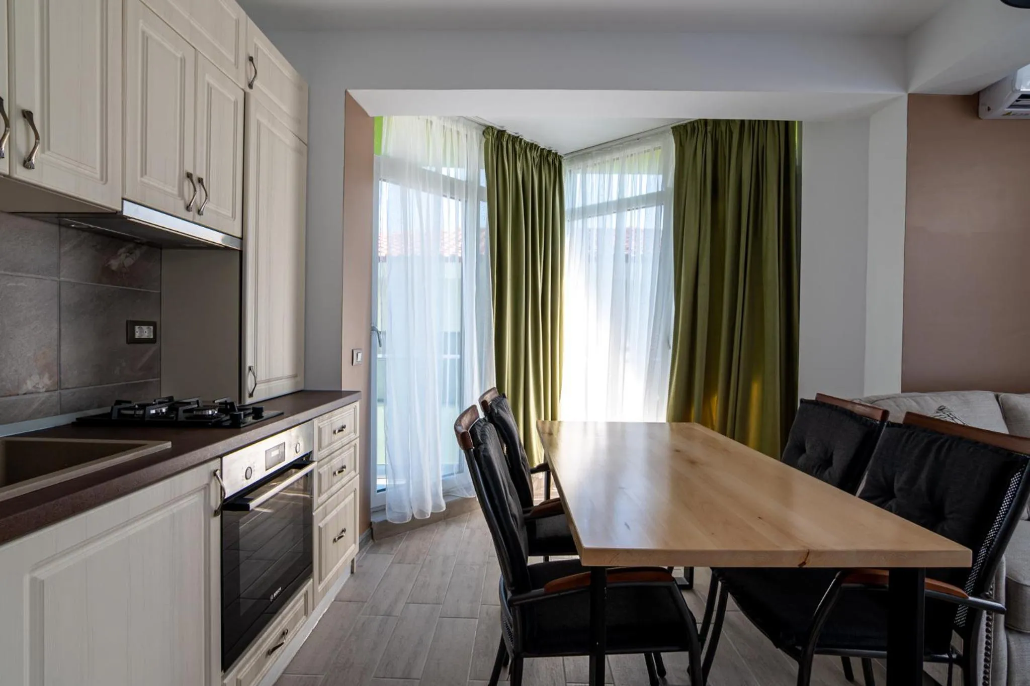 Kitchen or kitchenette in Apartamente Miramare by Alz
