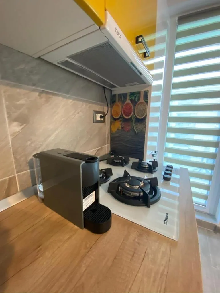 Kitchen or kitchenette in Apartamente Miramare by Alz