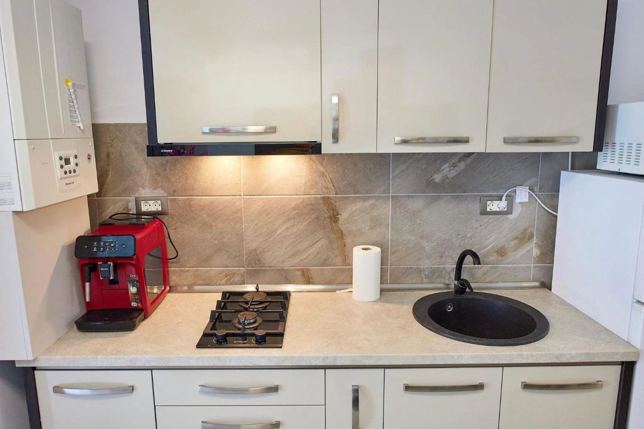 Kitchen or kitchenette in Apartamente Miramare by Alz