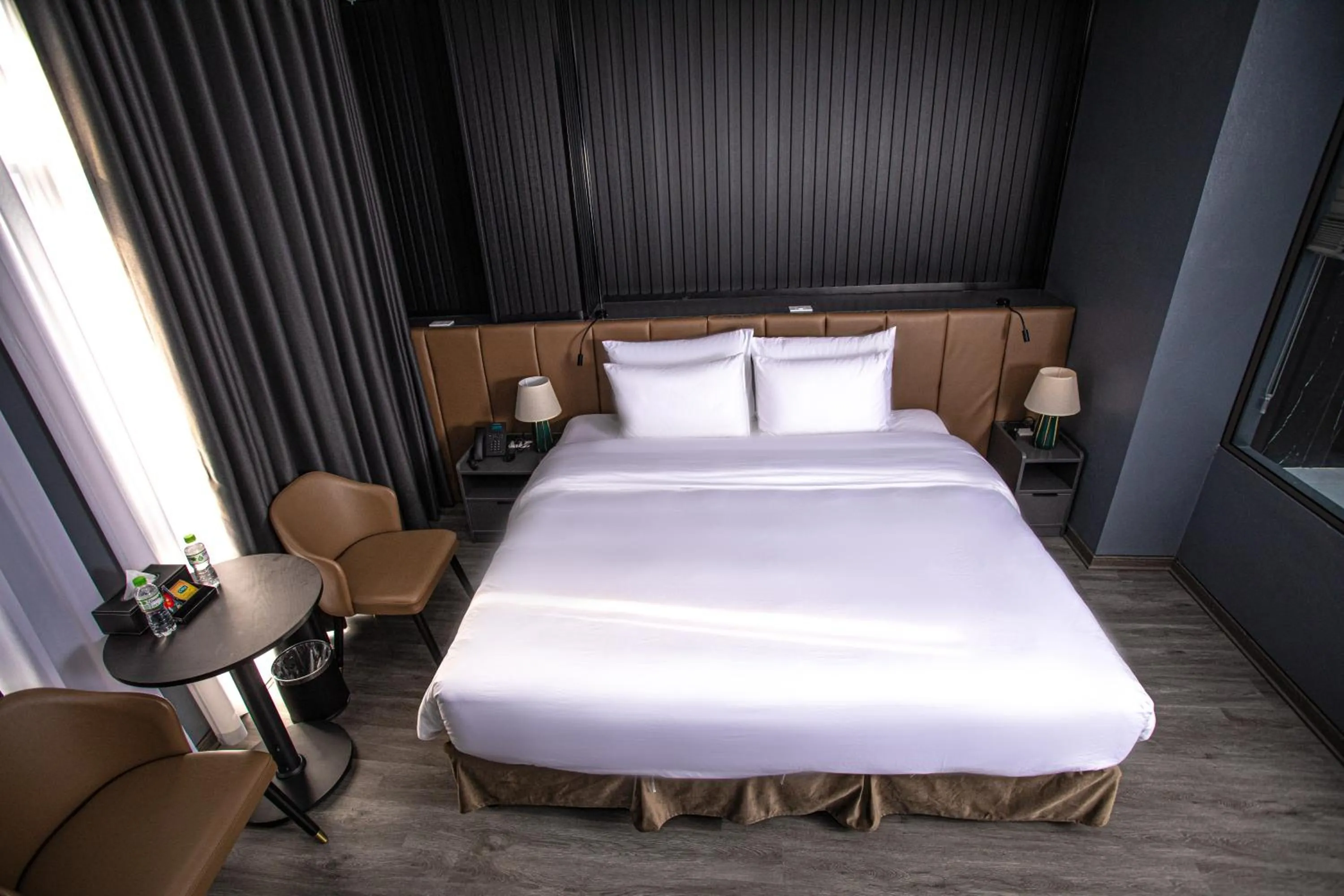 Bed in La Maison Boutique Hotel