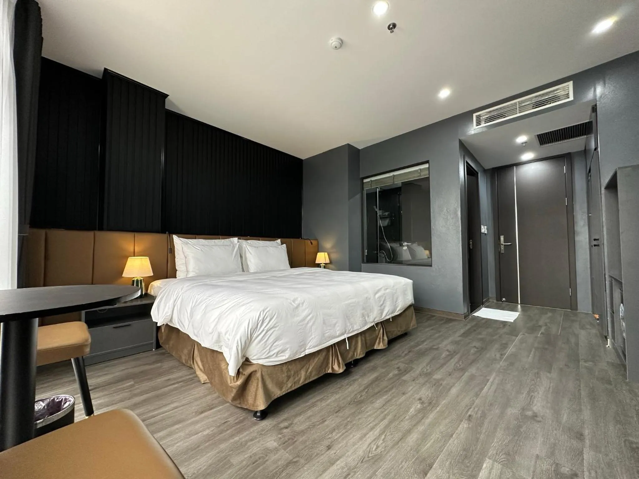 Bed in La Maison Boutique Hotel