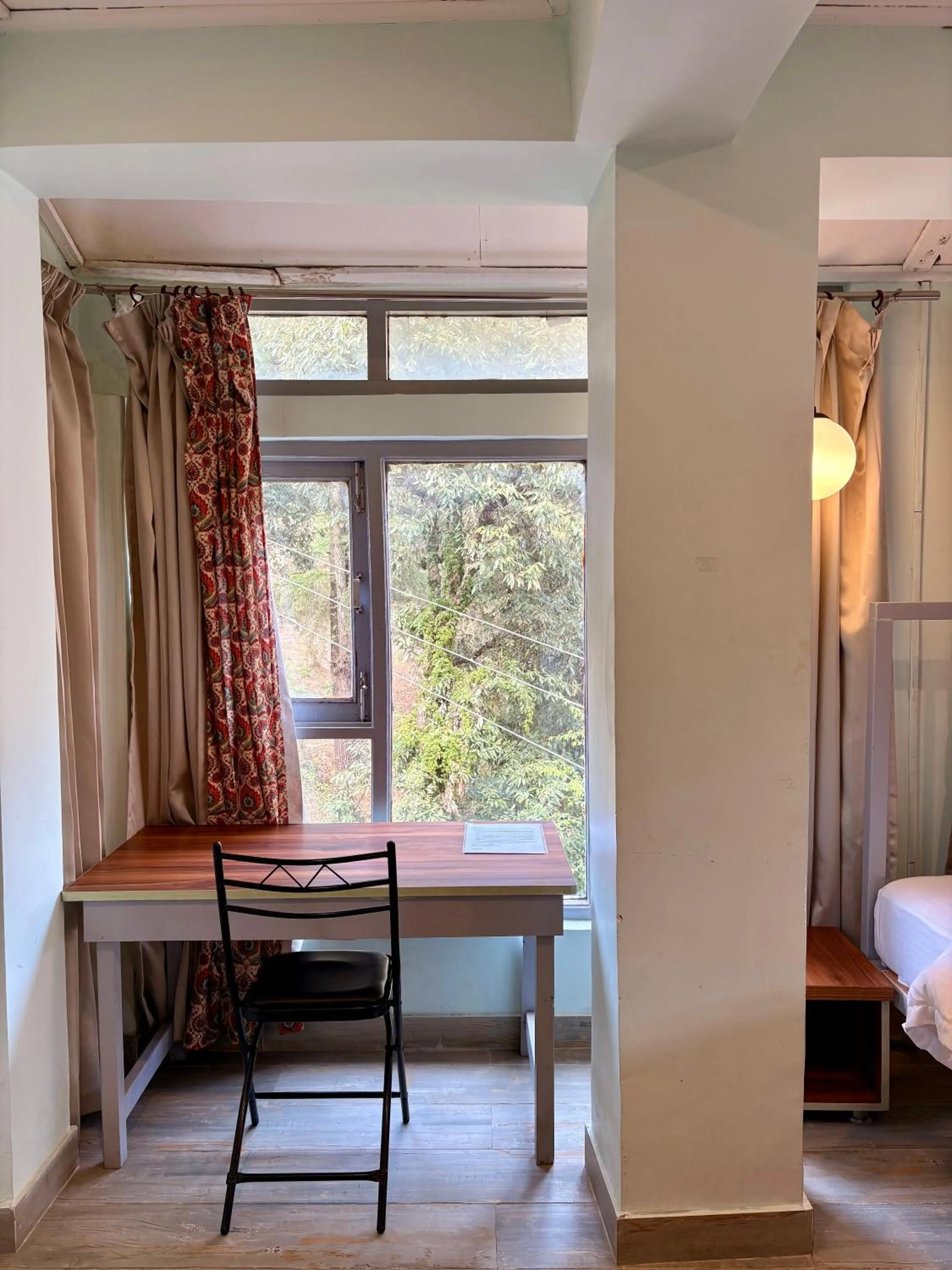 Seating area, Bed in Eevolve Dharamkot - An Eco Hostel