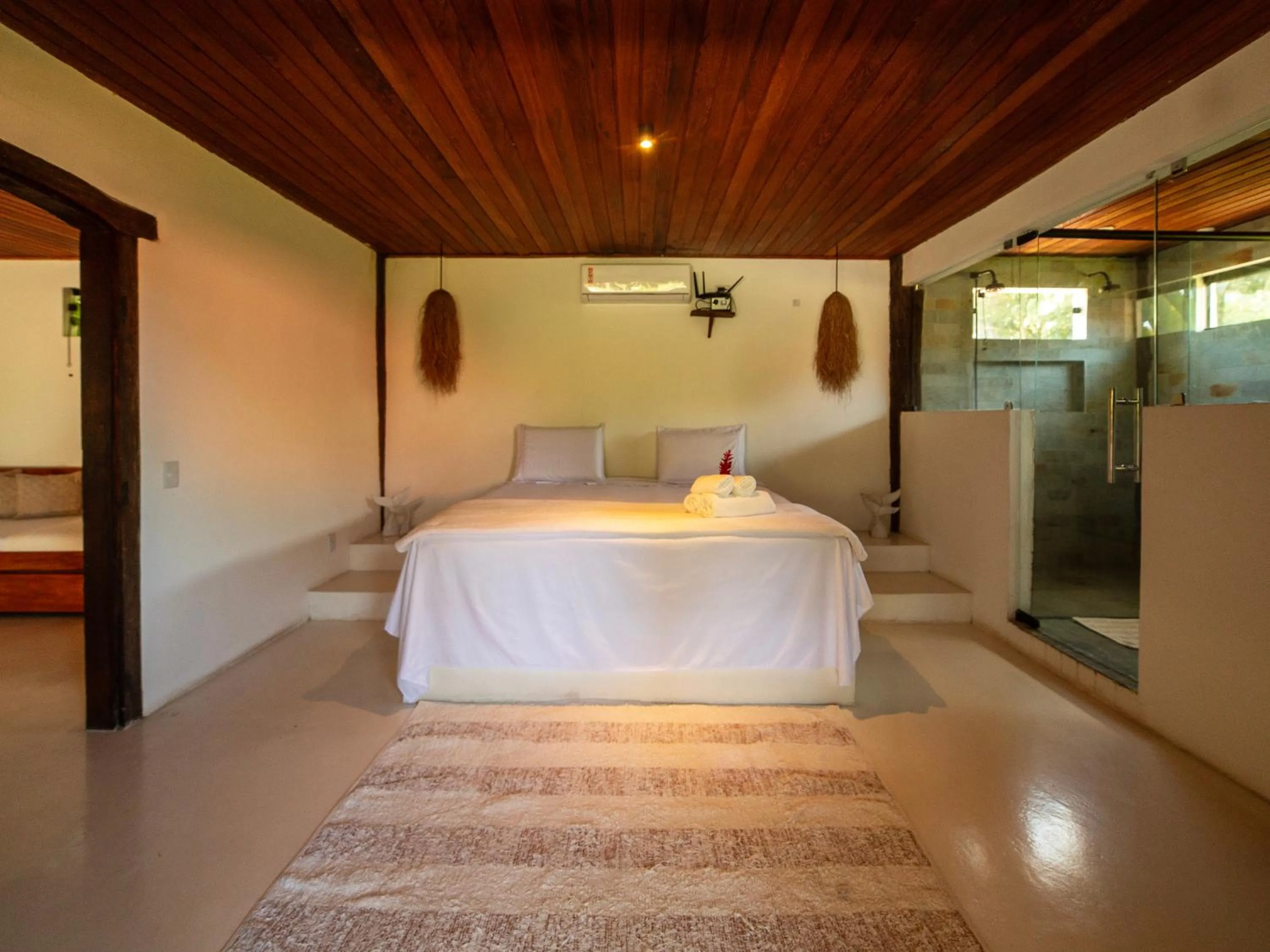 Bed in Pousada Casa da Praia