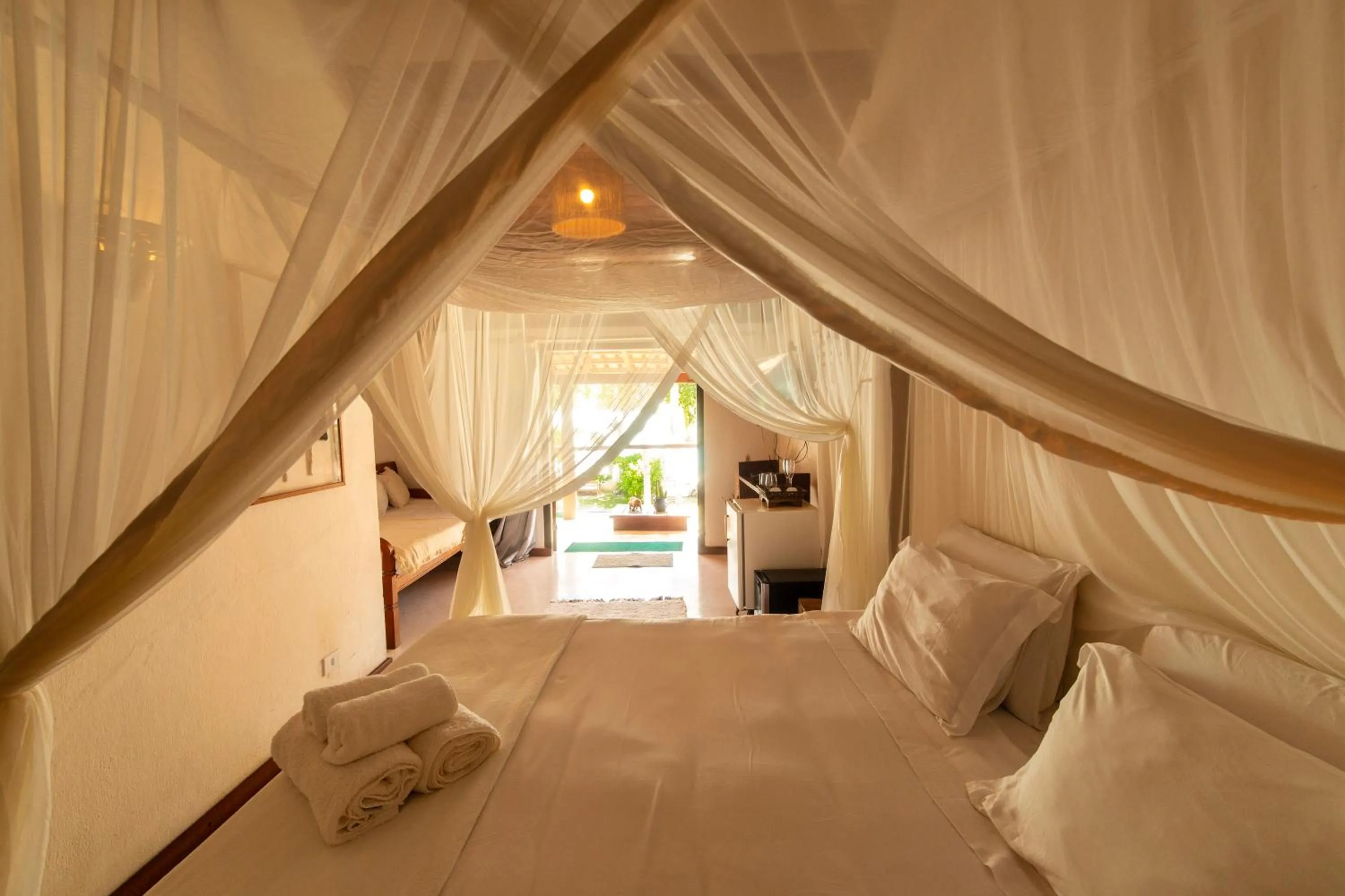Bed in Pousada Casa da Praia