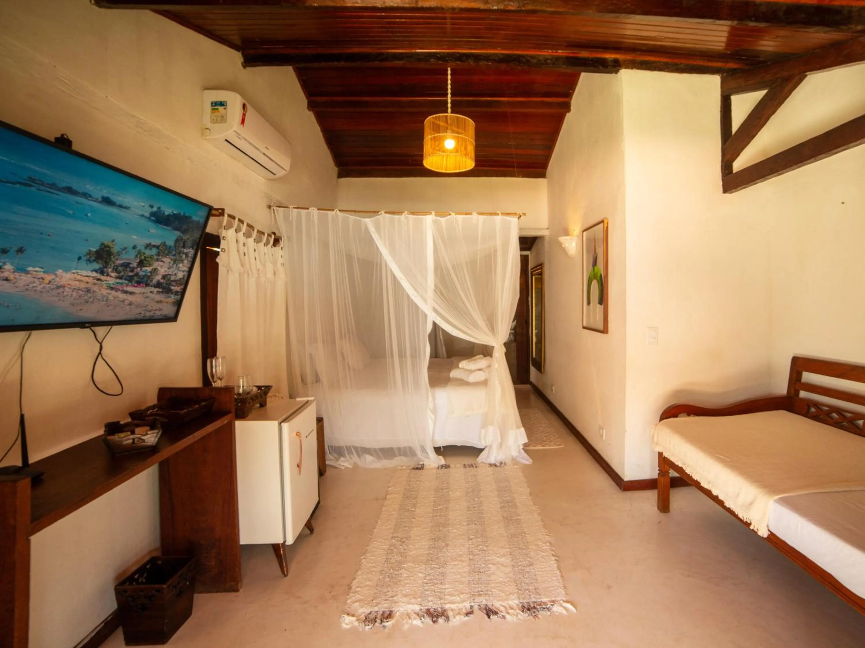 Bed in Pousada Casa da Praia