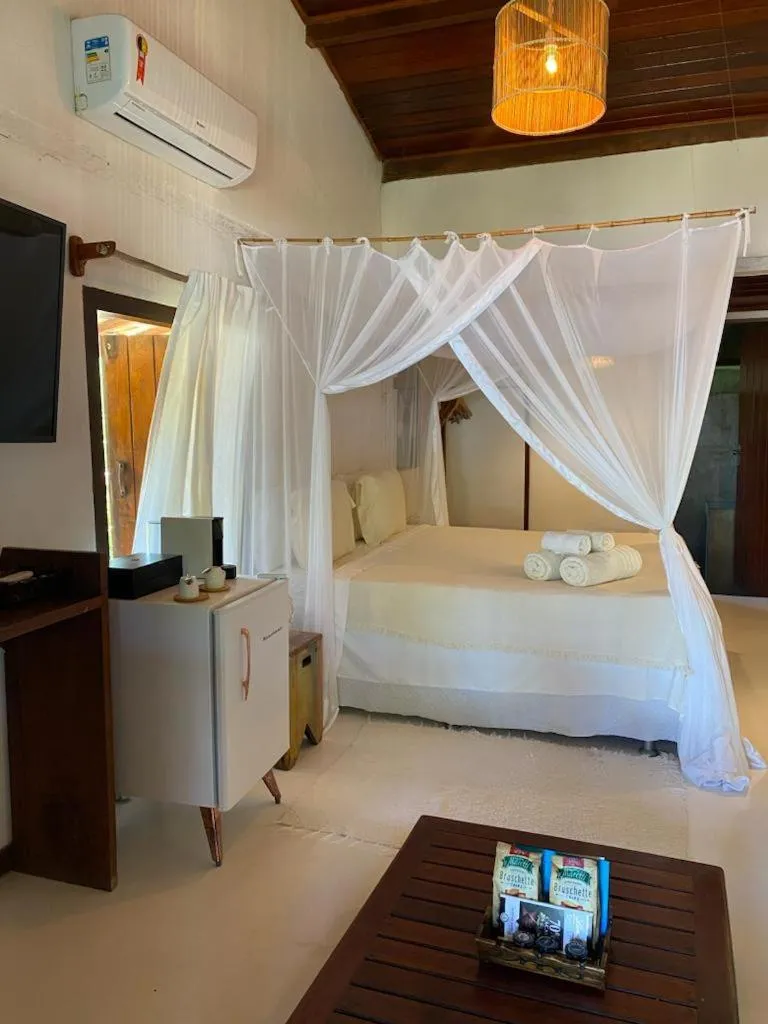 Bed in Pousada Casa da Praia