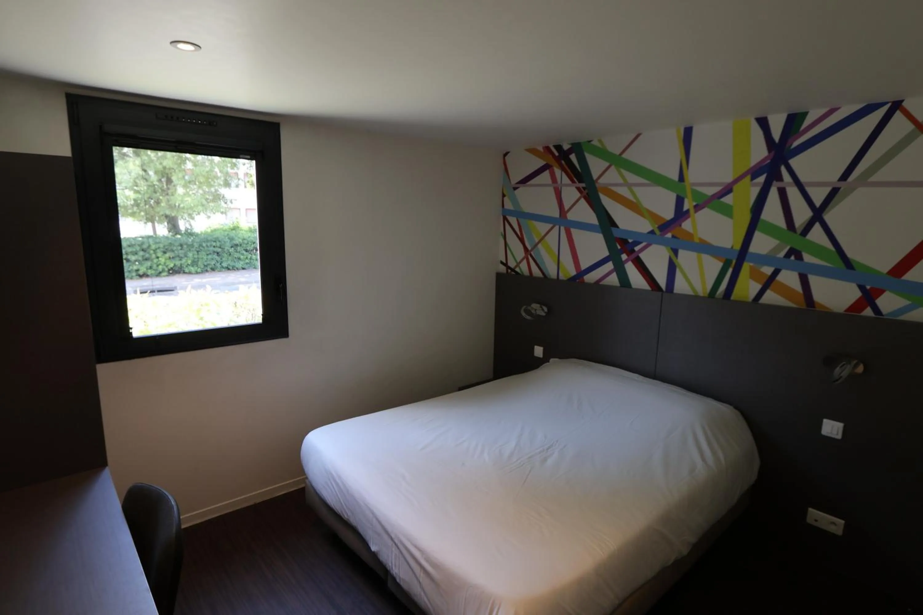 Bedroom, Bed in Brit Hotel Montpellier Euromédecine