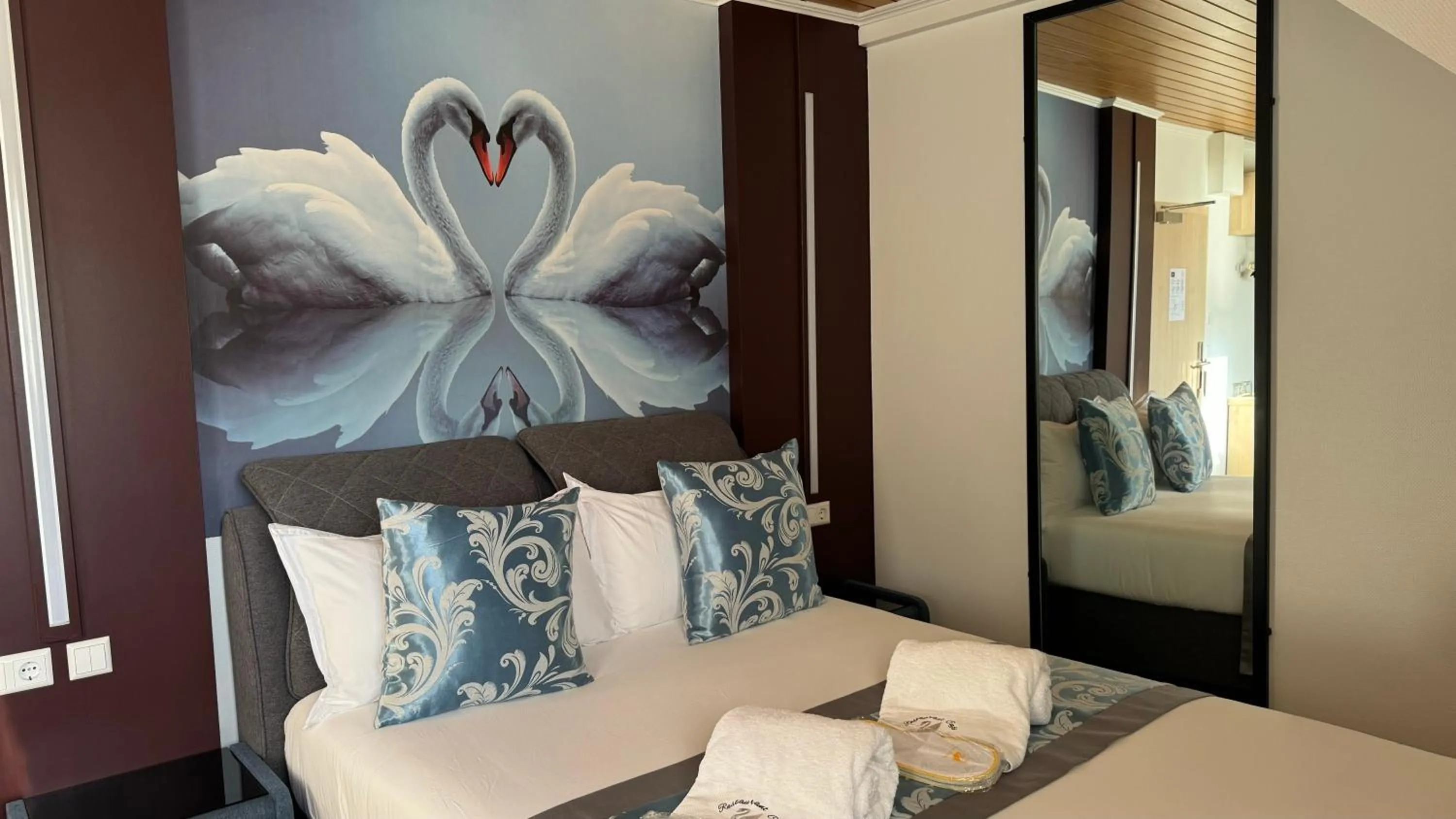 Bed in hotel whiteswan