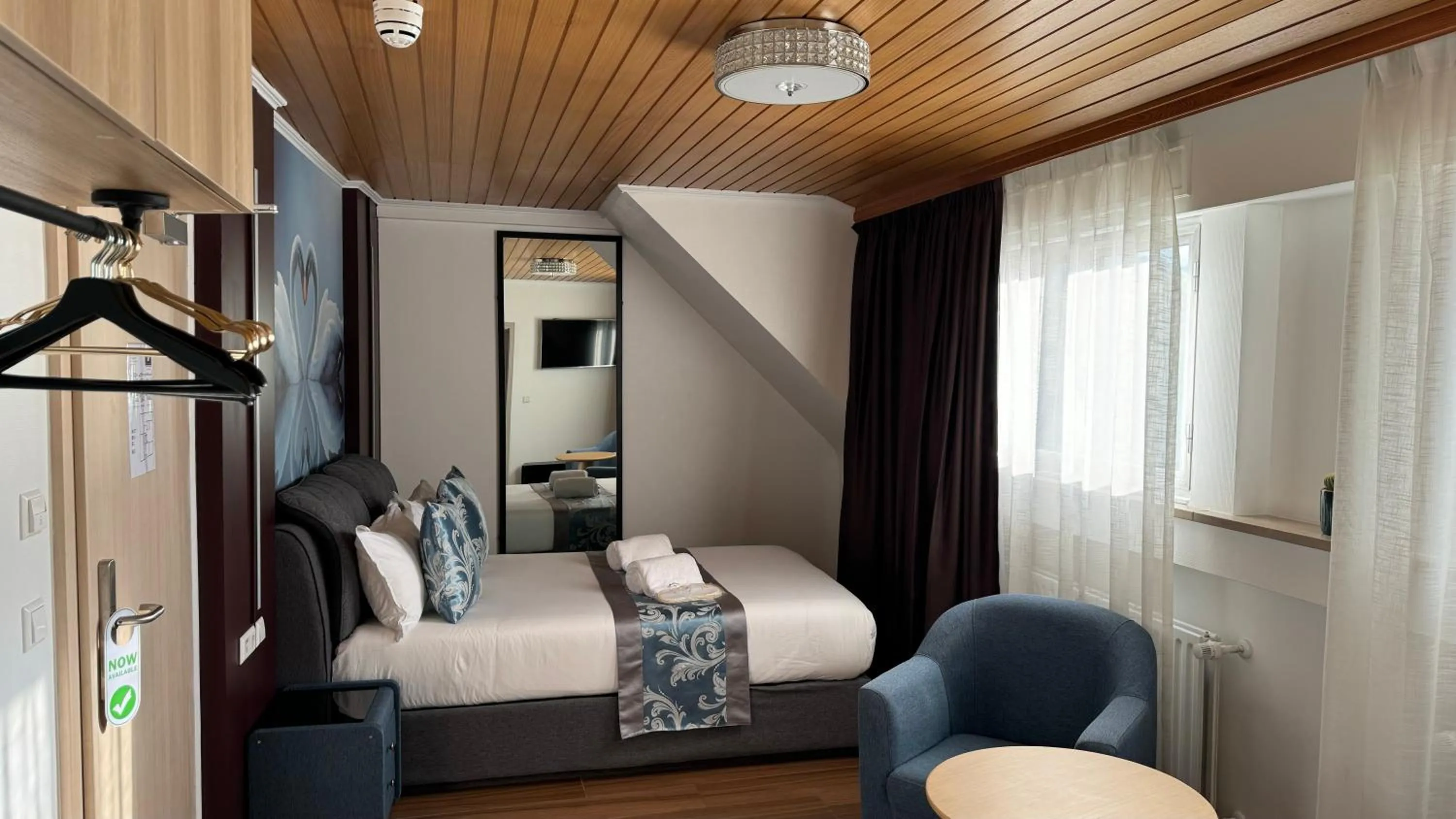 Bed in hotel whiteswan