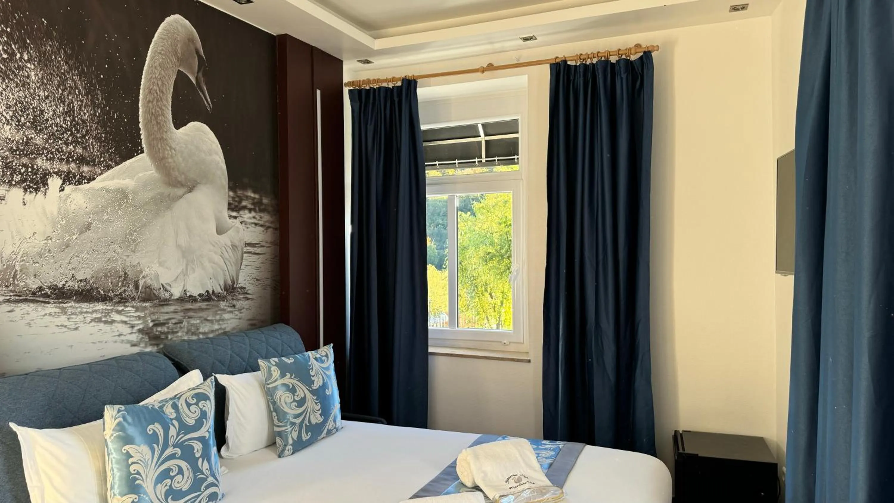 Bed in hotel whiteswan